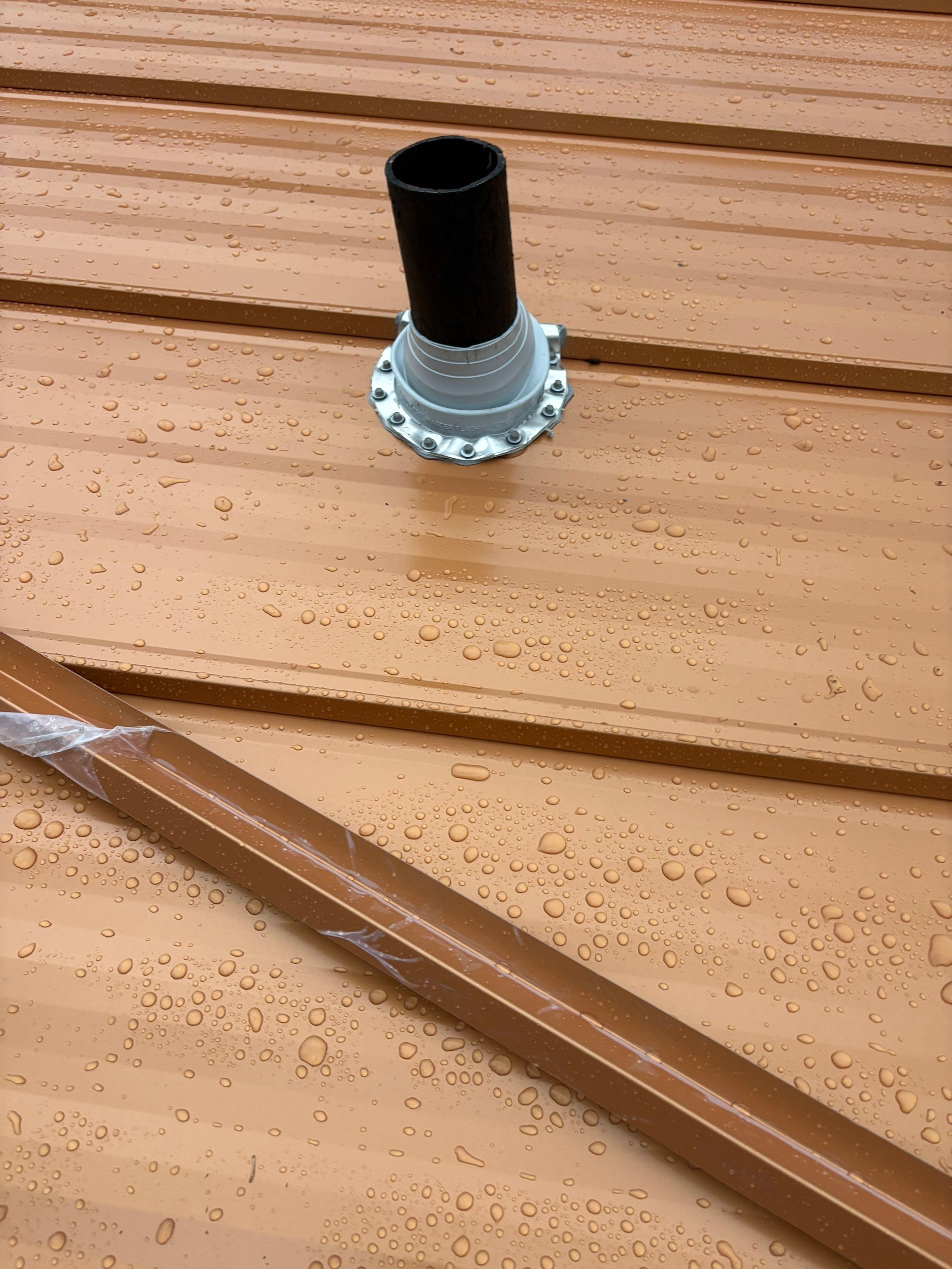 Standing Seam Metallic Copper Metal Roof Replacement in Deltona by Pinnacle Roofing Group