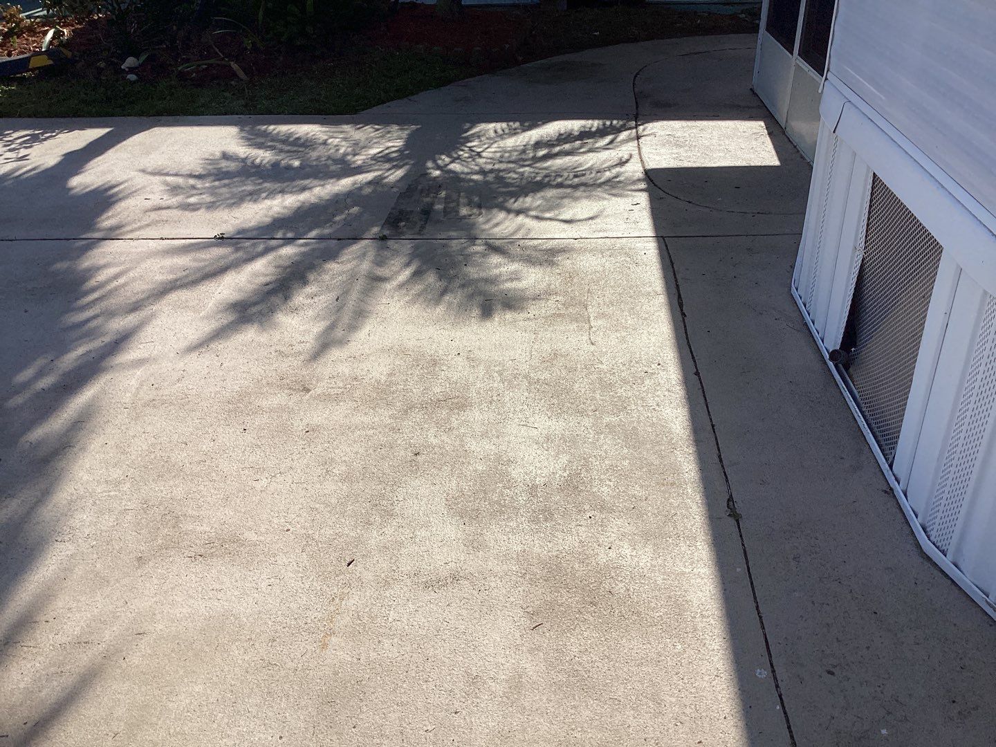 Driveway using Pebble Beach by Amvet concrete coatings llc