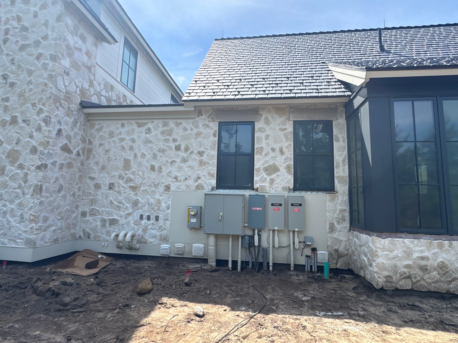 Half Round Gutter Installation for Petoskey Residence by Rainbow Seamless Systems