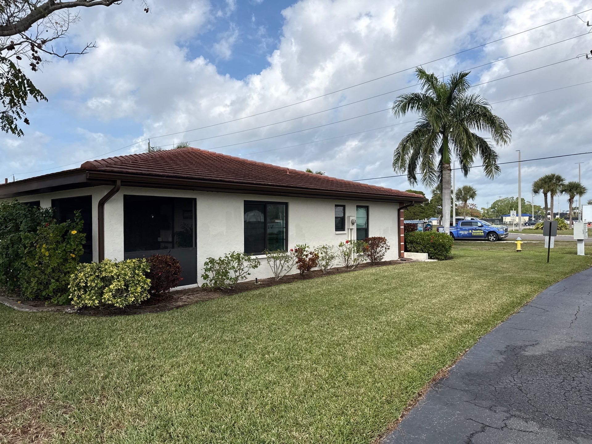 Tile Roof Cleaning in Vivienda at Bradenton I – Bradenton, FL by Sunshine AquaWash