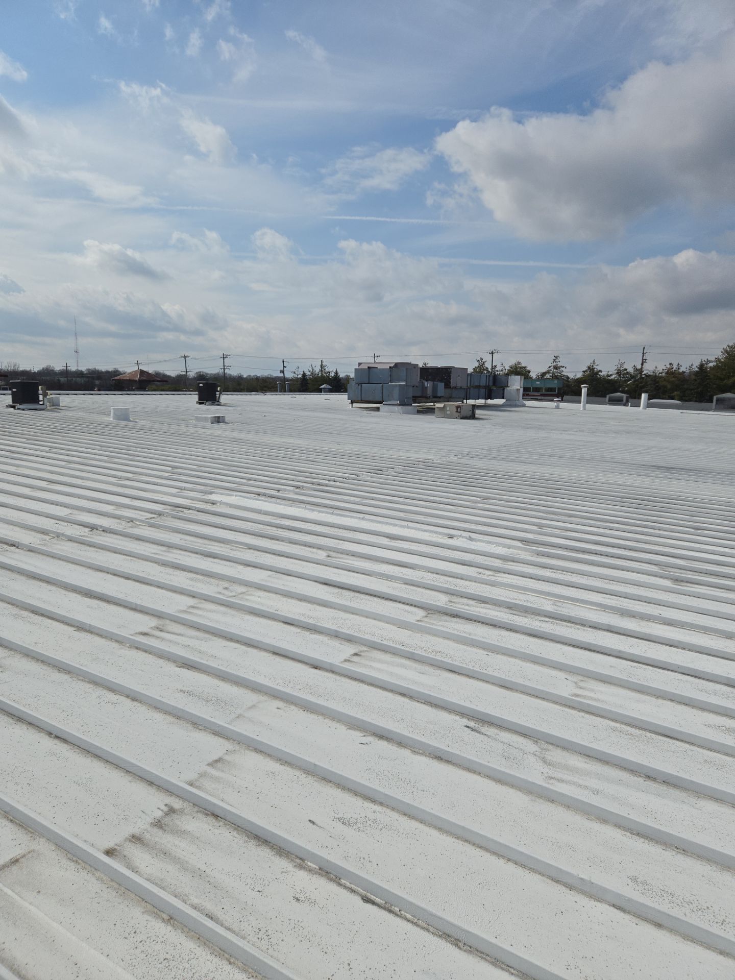 Commercial Metal and Flat Roof Repairs in Mason, Ohio by Level Up Roofing and Restoration Services LLC