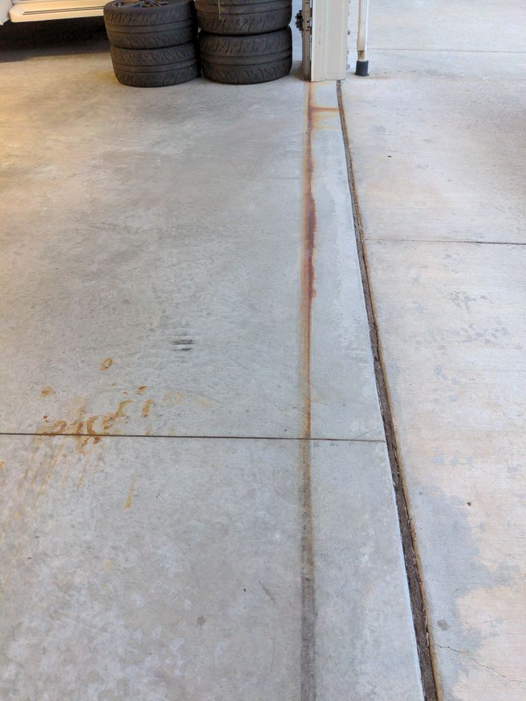 Garage Transformation using Domino by Croc Coatings, LLC