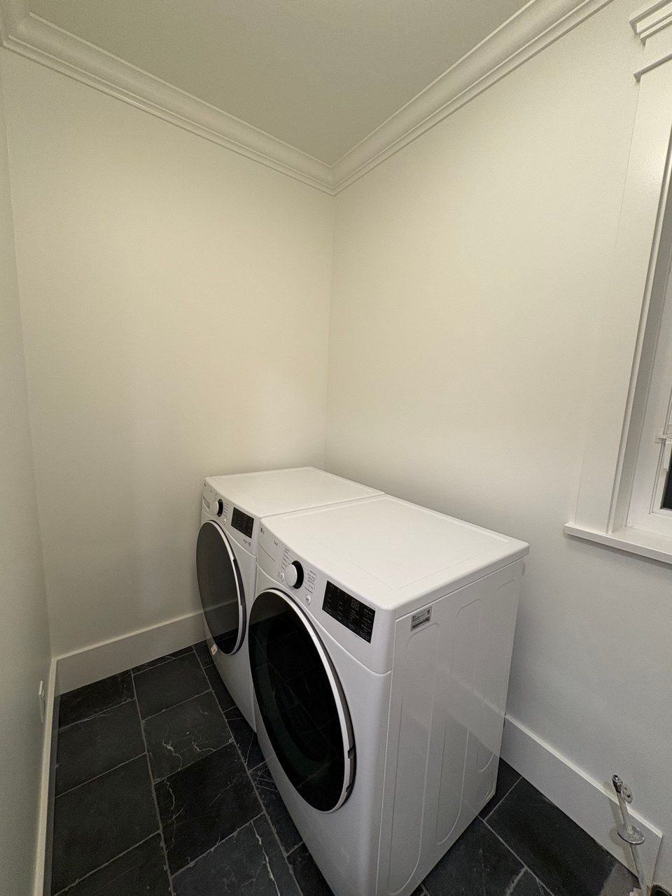 High-End Laundry Room Renovation and Restoration in Vancouver by YVR Construction Group