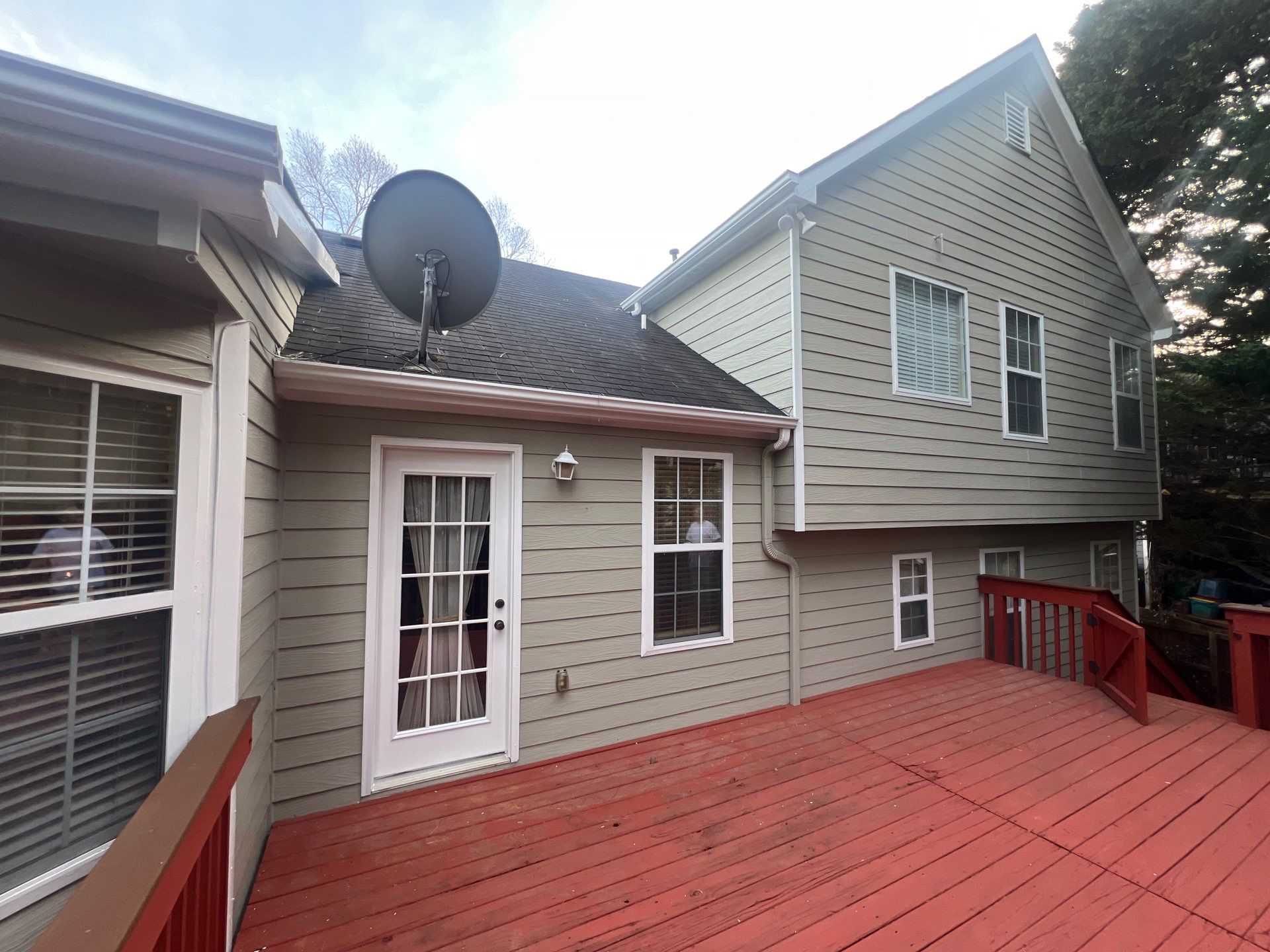 Exterior Residential Painting and Deck Staining in Kennesaw, Georgia by Swift Home Renovations