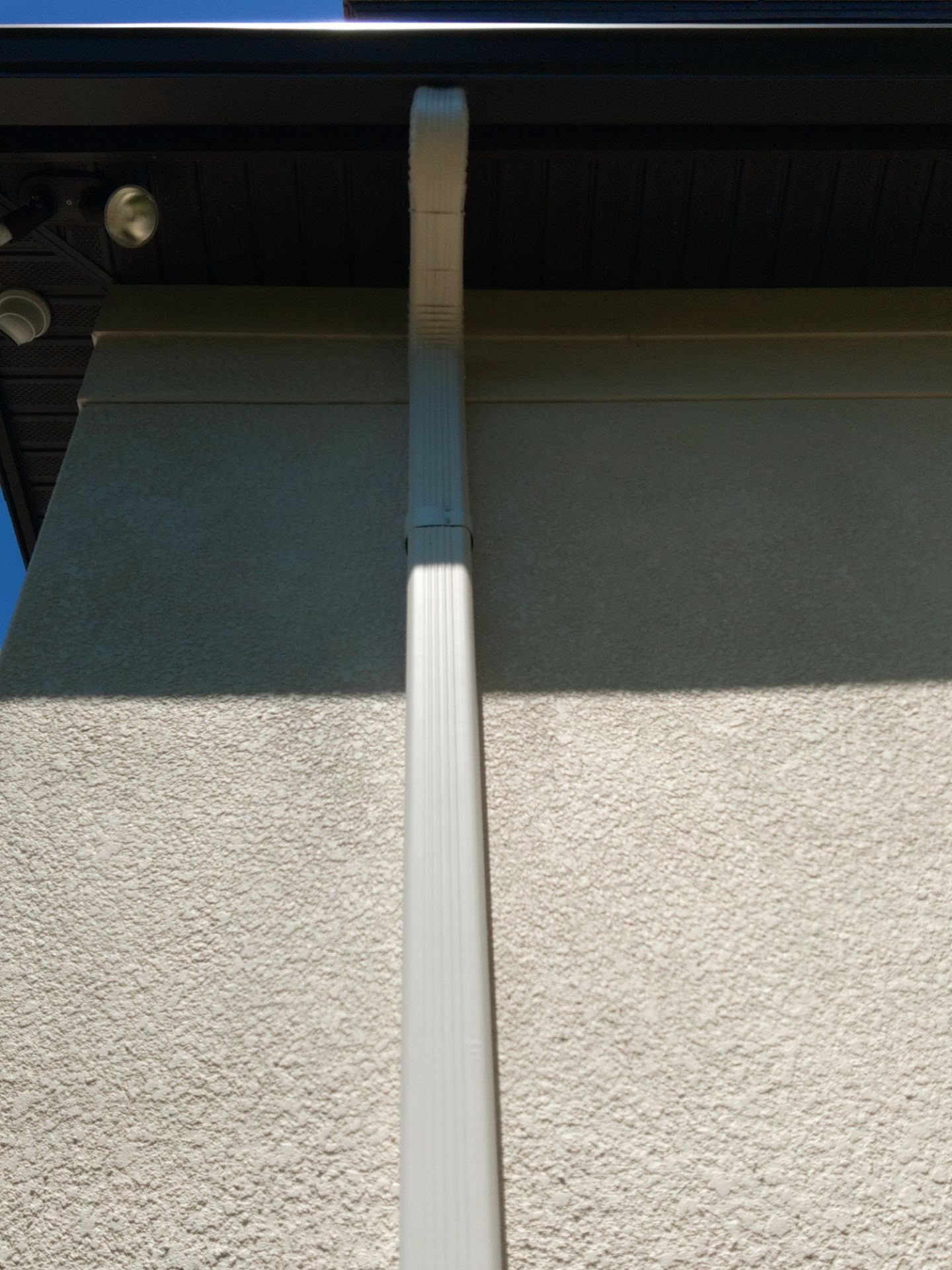 Bronze Gutters and Almond Downspouts in Longboat Key FL by Gutter Professors