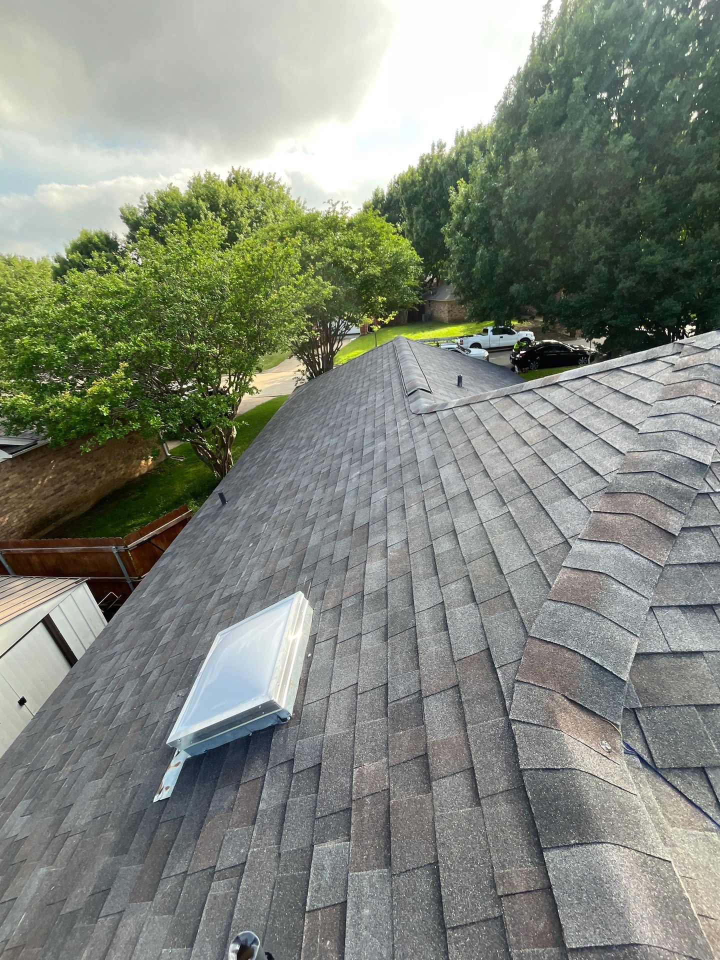 New Sky light/ New Roof/ Gutters and Fence Staining.  by Berry Good Roofing 
