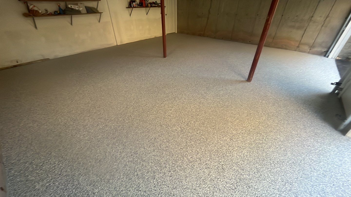 Garage in Londonderry, NH 03053 by Symphony Concrete Coatings