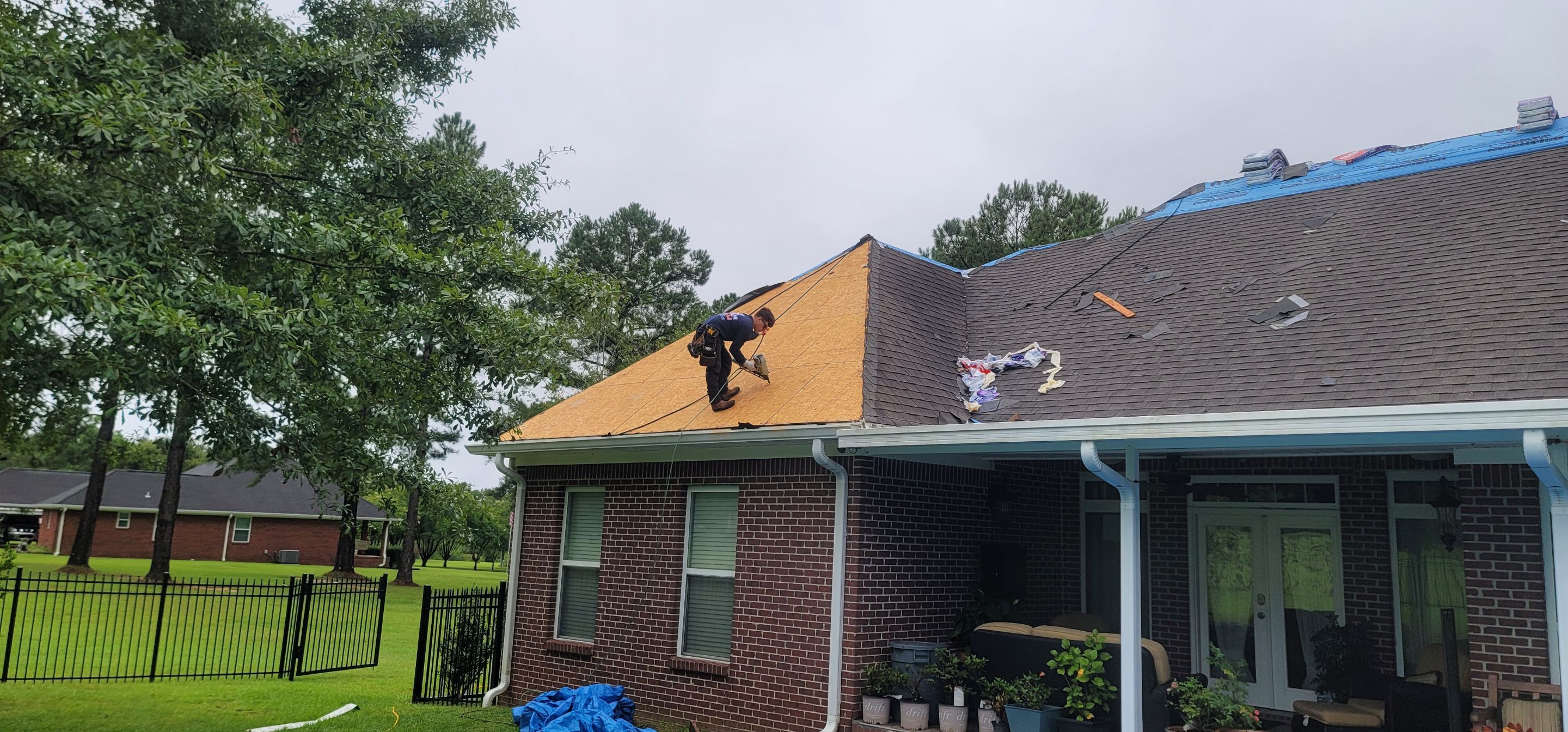 Residential Roofing Installation using Roof Replacement by American Roofing & Construction LLC