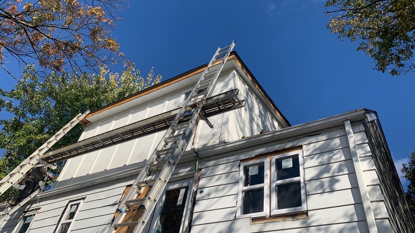Room addition on the second floor of house by Greenspring Construction Services