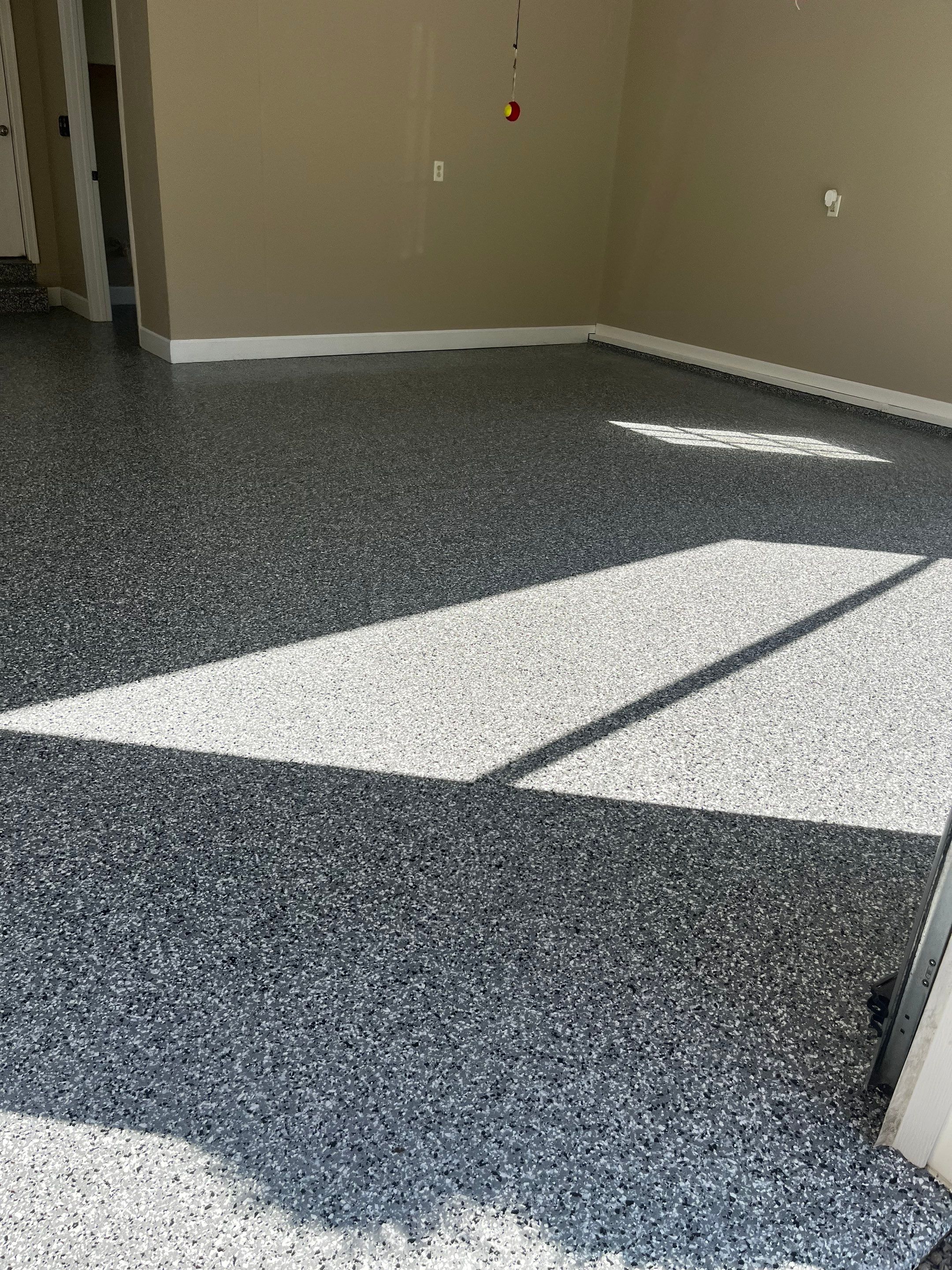 Garage Floor Coating using Wombat by My Garage Floor Guys