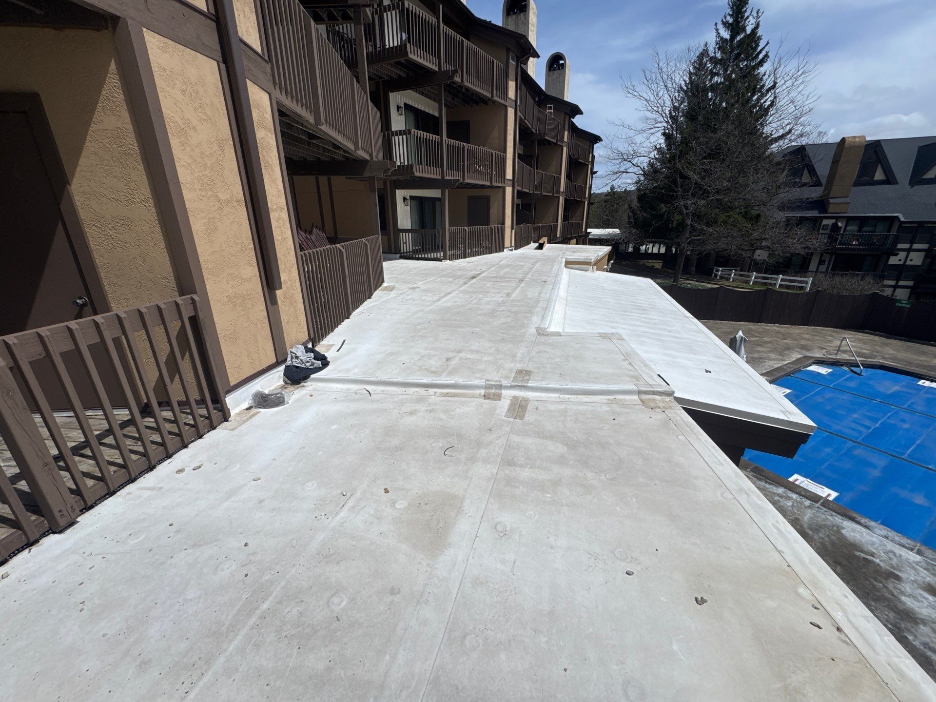 Gutter and Gutter Helmet Installation for Harbor Springs Hotel by Rainbow Seamless Systems