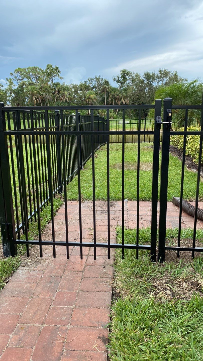 Aluminum Fence Installation using Black 3 Rail Aluminum Fence by Asap fence and gates, LLC