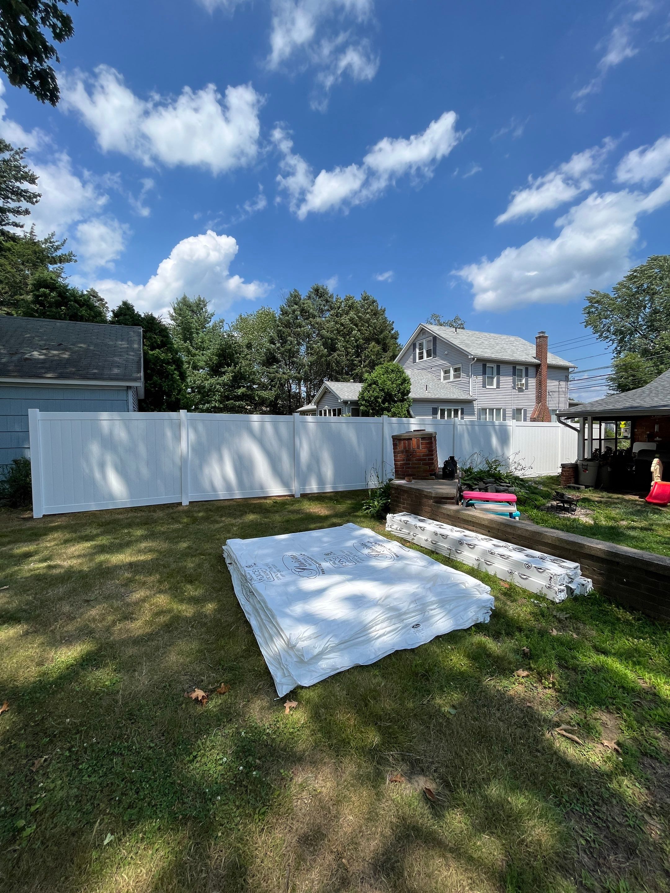 Vinyl Privacy fence White by DiGiorgi Roofing and Siding Inc