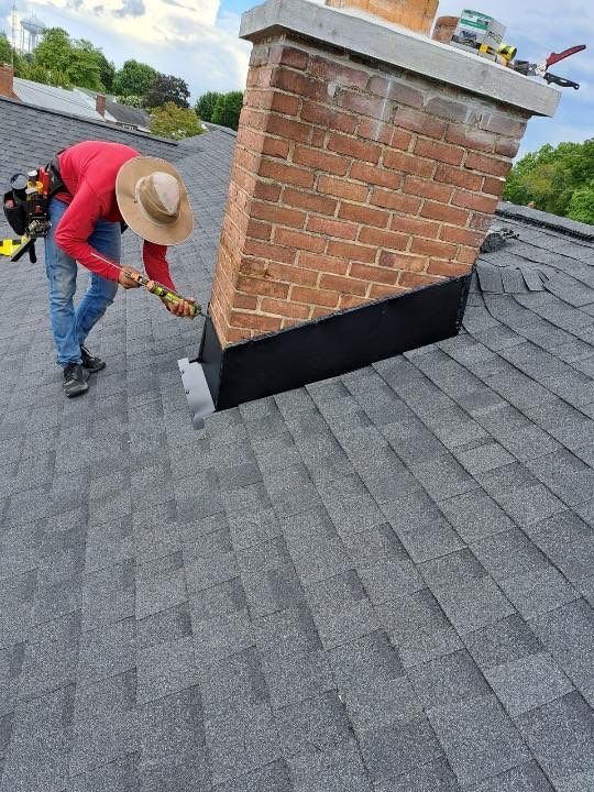 Residential Roofing Installation using Atlas Pinnacle Pristine Black Architectural Shingles by Frederick Roof Repair