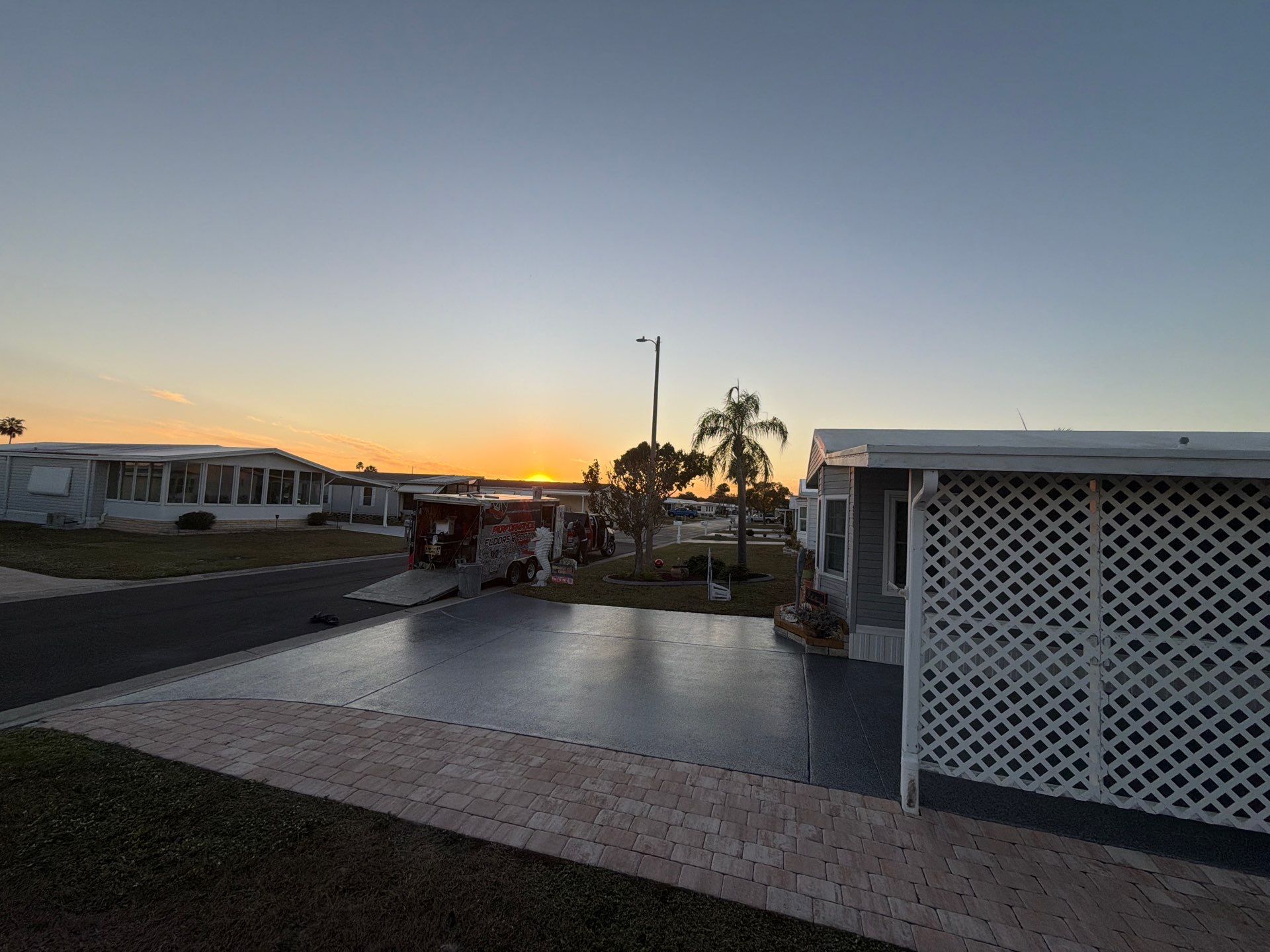 Driveway Transformation: Nightfall Flake System with Full UV & Moisture Protection by Performance Floors & Coating