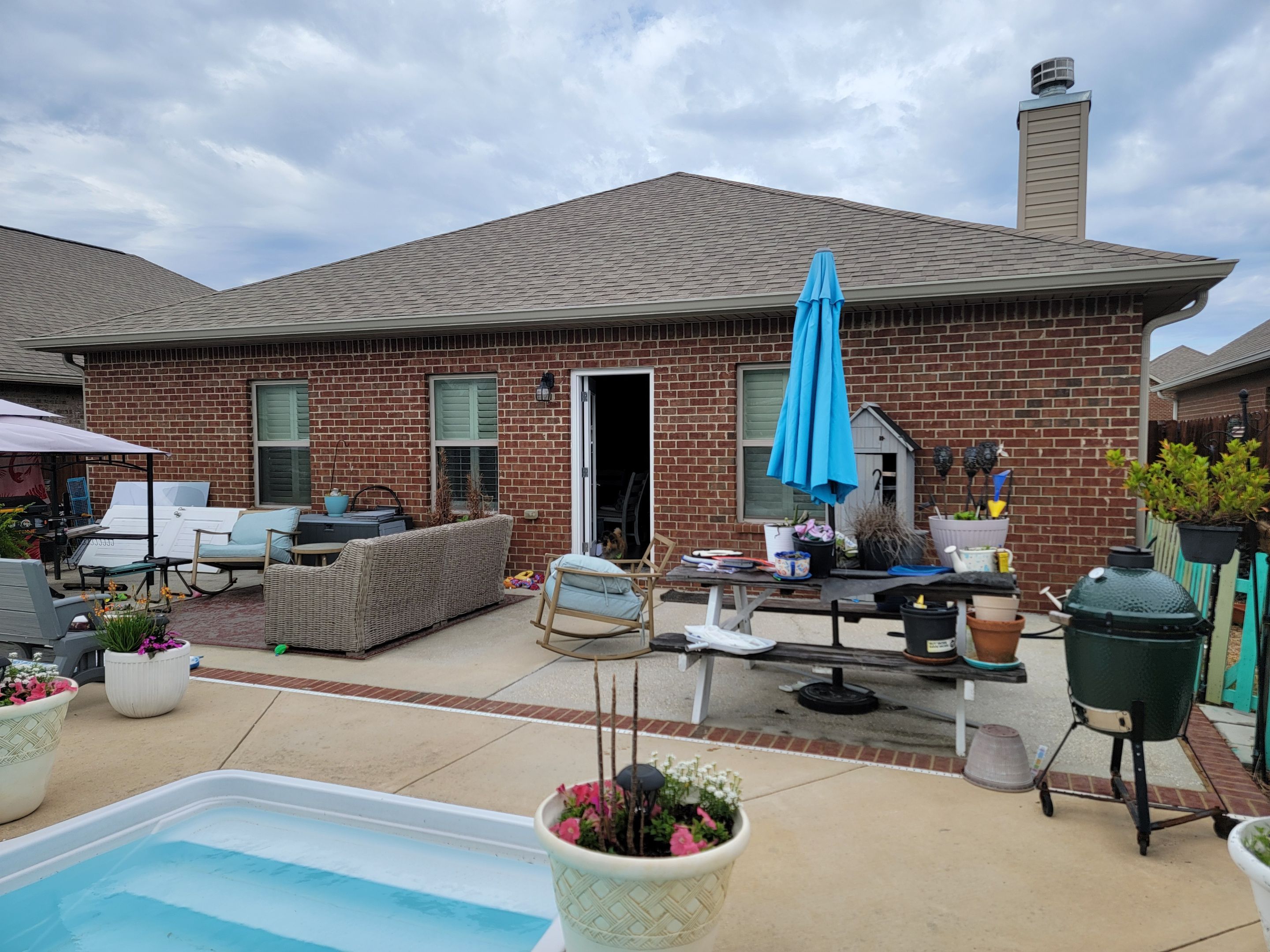 Poolside Screen Room & Patio Cover in Gulf Breeze by Titan Sunrooms