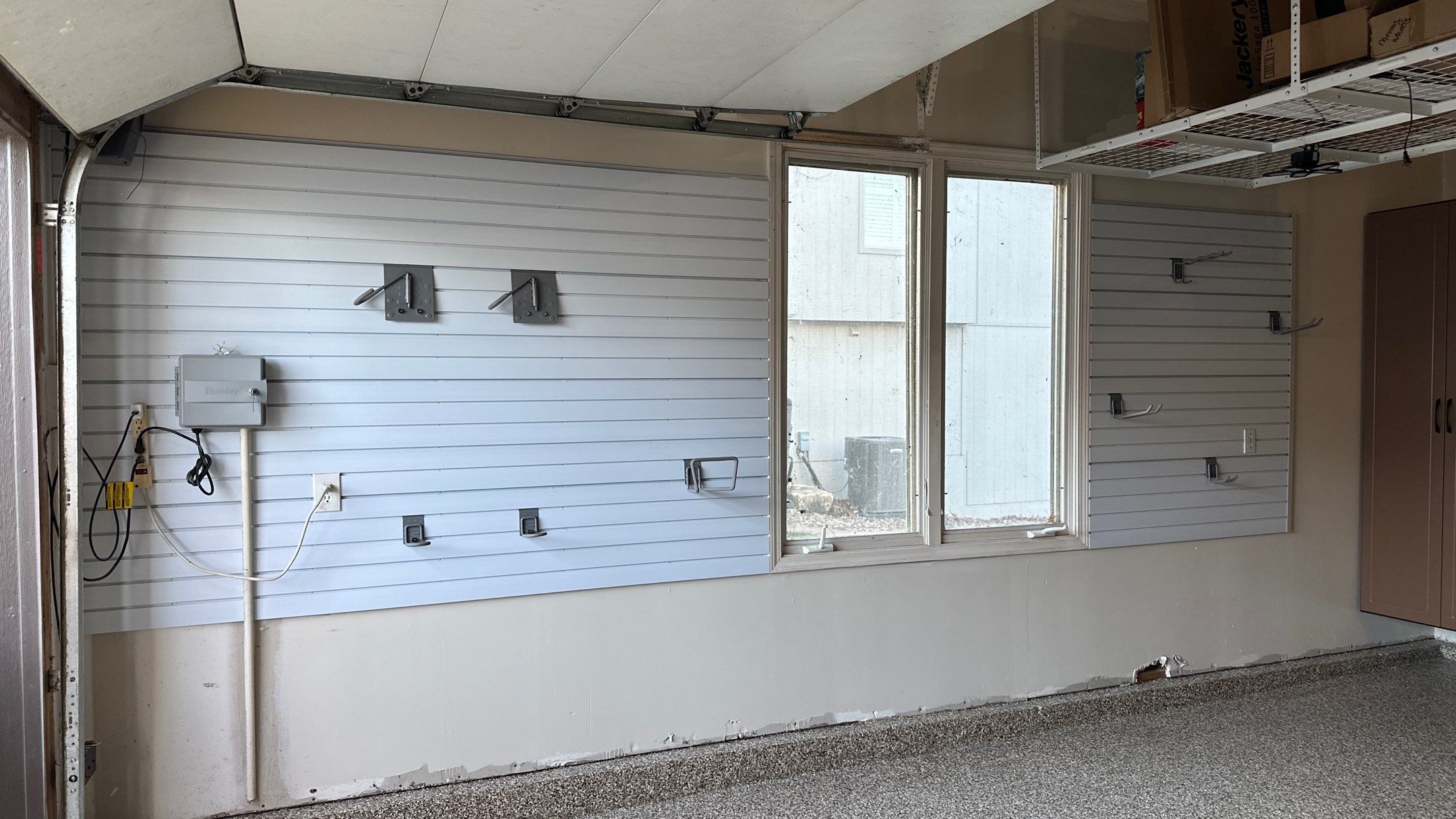 Jake P upgraded his garage with brand new cabinets and a new floor  by Banner Garage