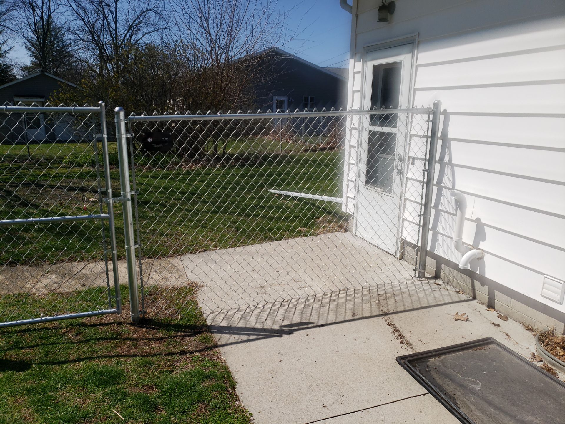 Residential Galvanized Chain Link Perimeter Fencing and Gate Installation by Perfect Picket Fence and Stain
