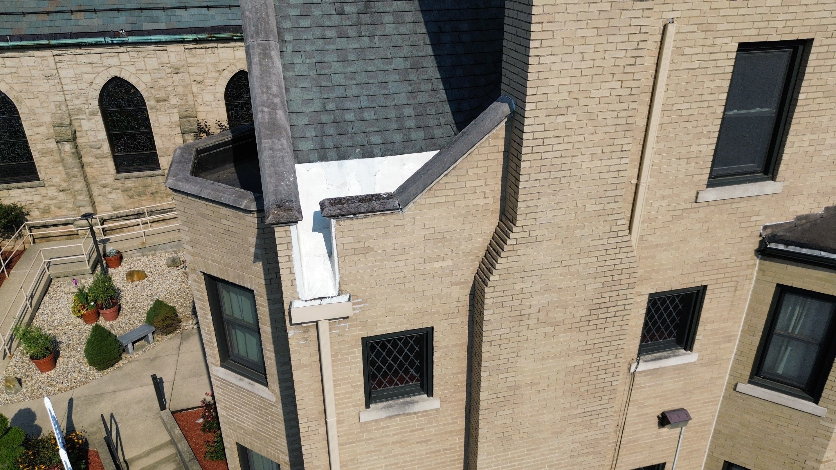 Commercial Roofing Installation using Standing Seam Metal - Frost Black by RoofX 