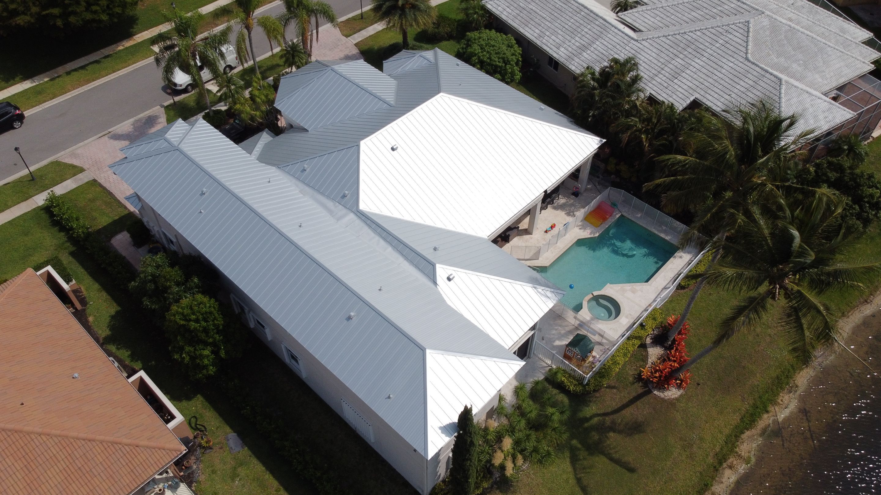 Residential Roofing Installation using 1" Nail strip metal roof by BLUES BROTHERS CONSTRUCTION CORP