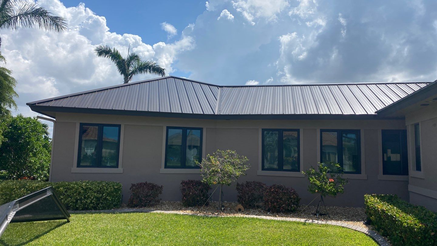 Residential Roofing Installation using Standing Seam Metal Roof in Cape Coral, FL by International Roofing