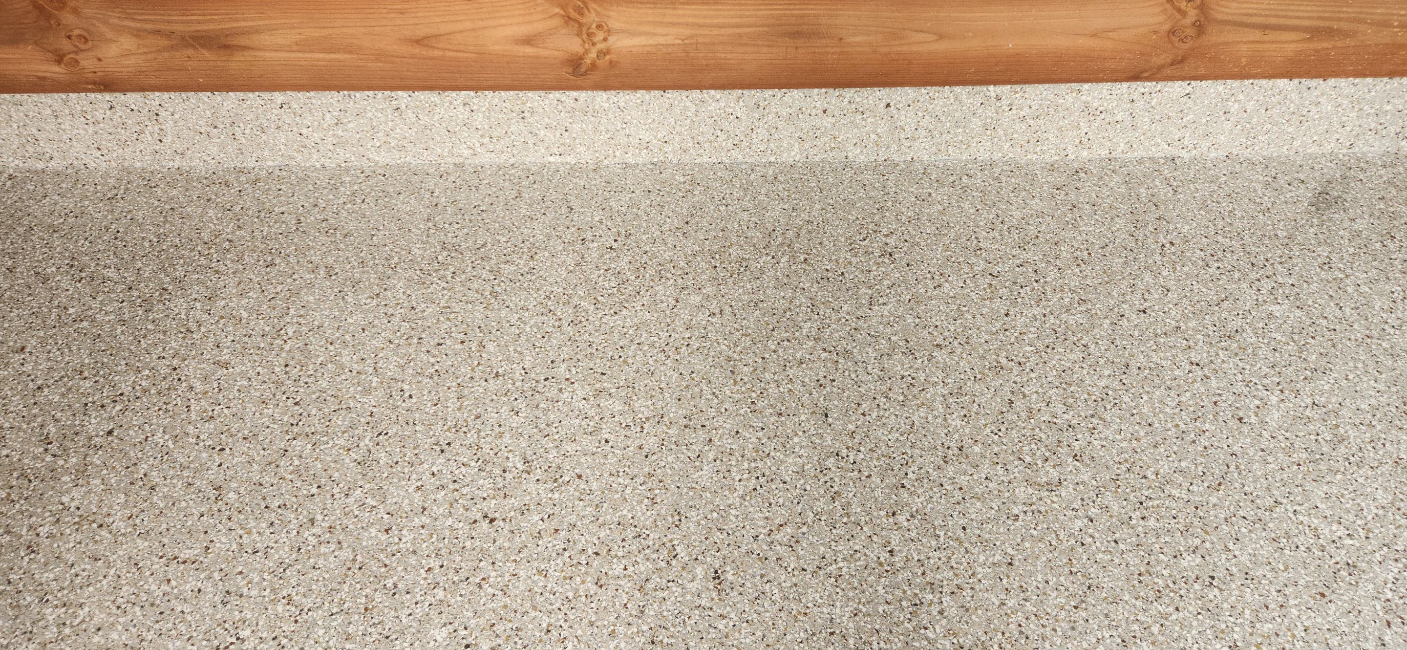 Front Porch and Garage using Creekbed by Elite Floor Solutions