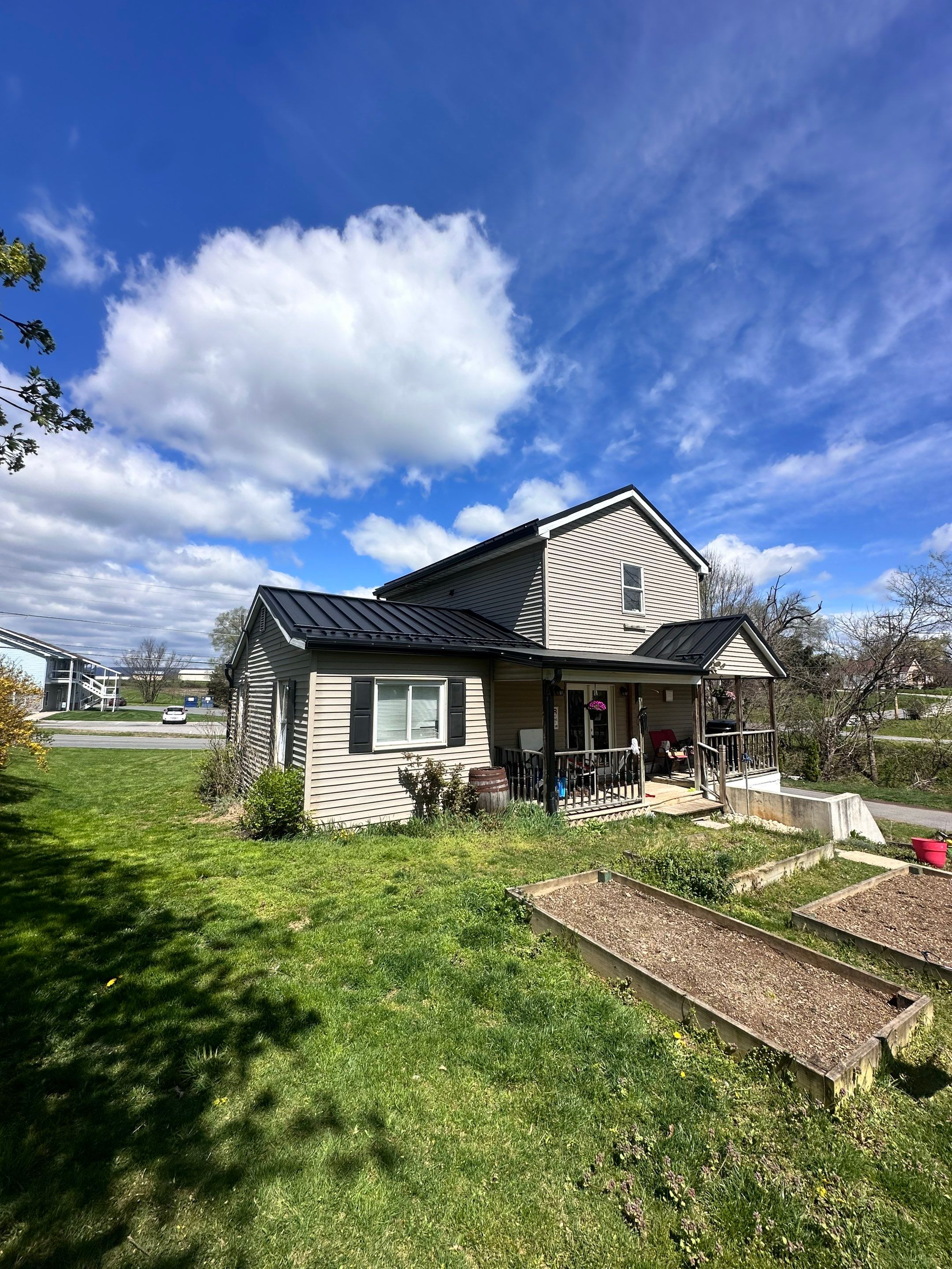 Residential Roofing Installation using Texture Standing Seam by Teflon Roofing