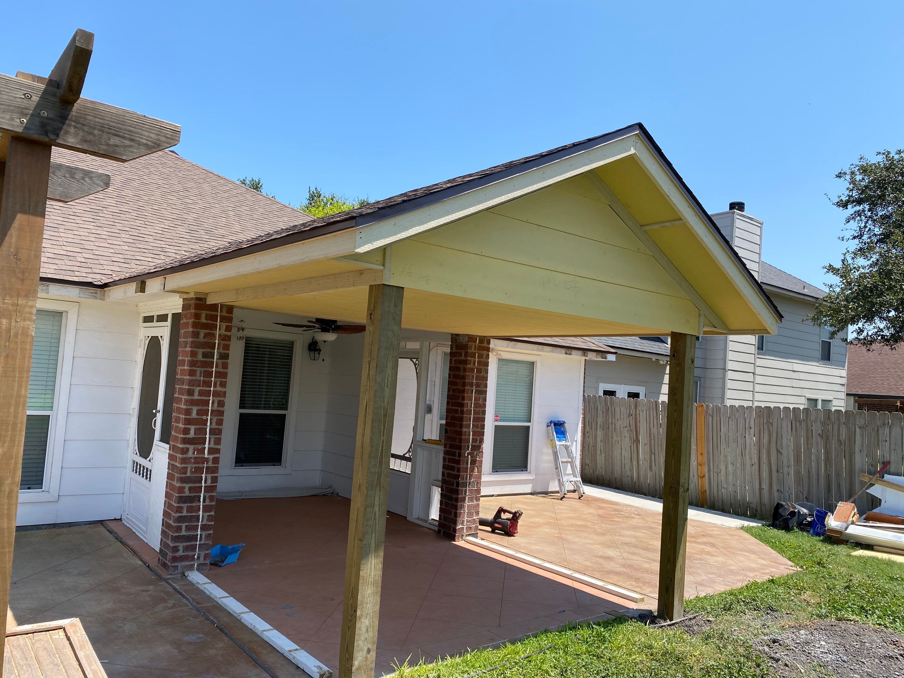 Back Yard Shade by Bayfront Roofing and Construction