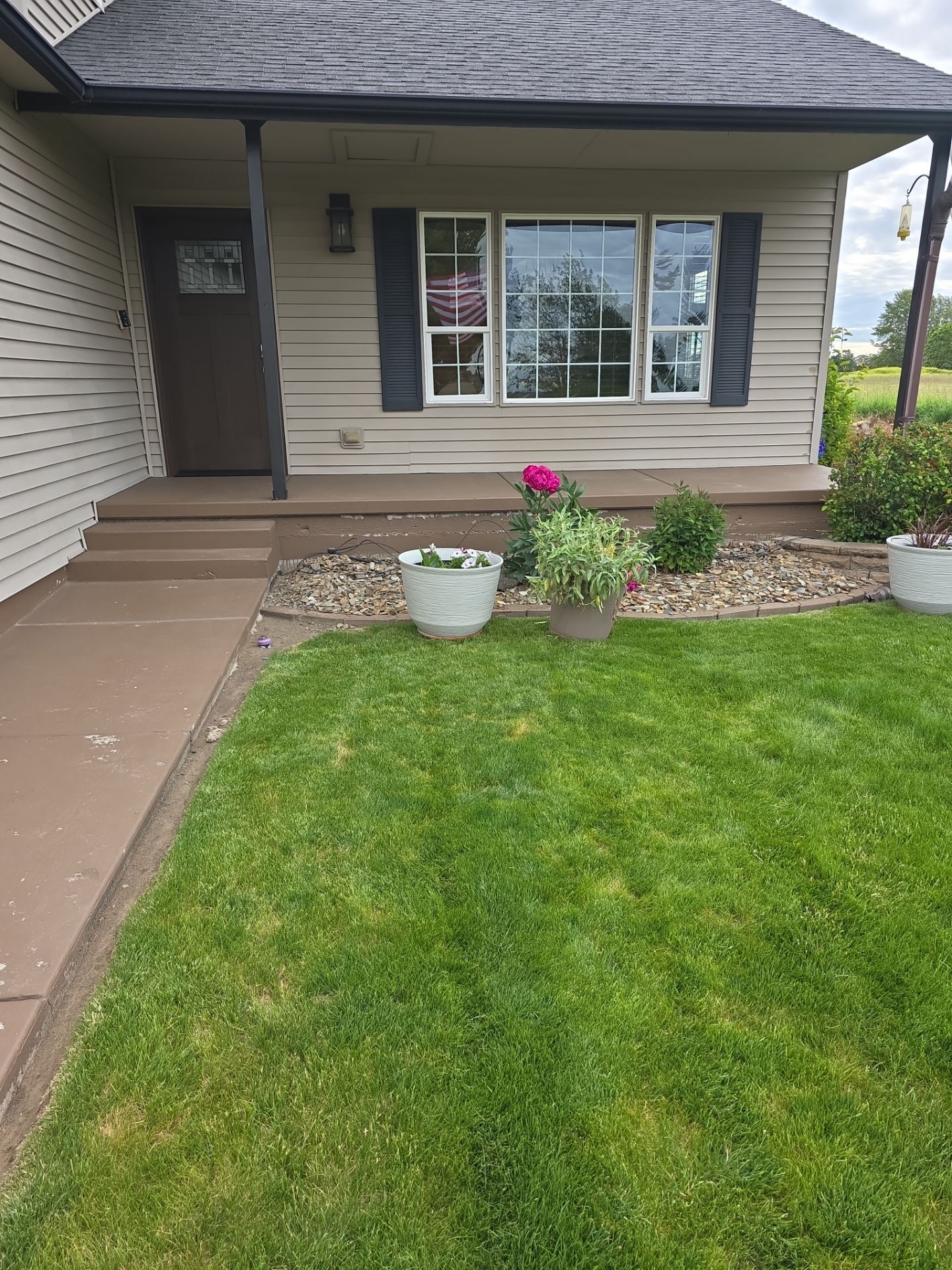 Concrete Patio and Walkway Coating Transformation in Cheney by Croc Coatings, LLC