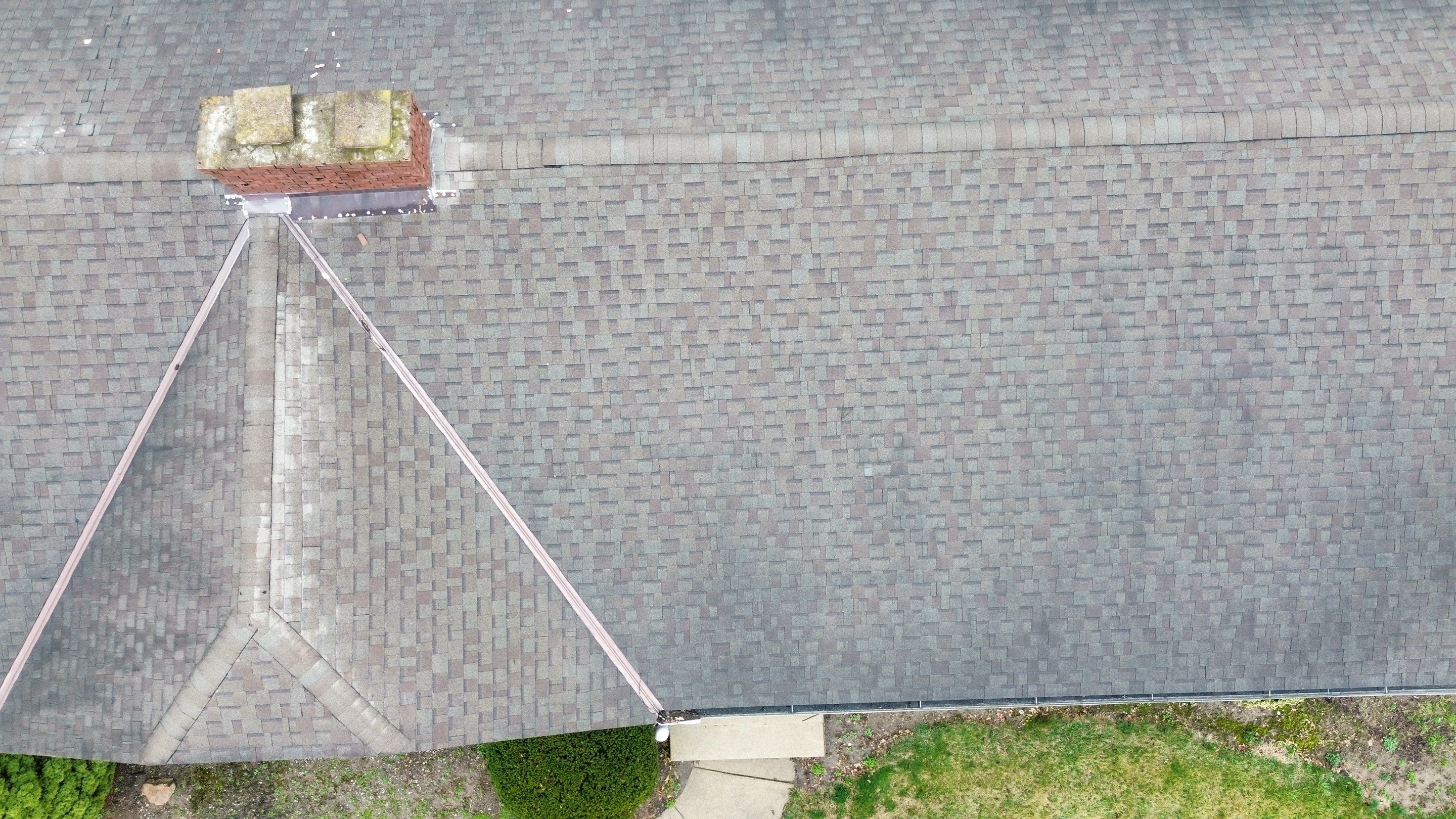 Residential Roofing Installation using Performance Panel Metal - Crinkle Bronze by RoofX 