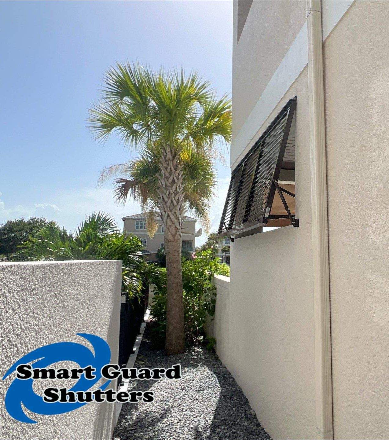 Impact Bahamas in Grey Brown  by Smart Guard Shutters