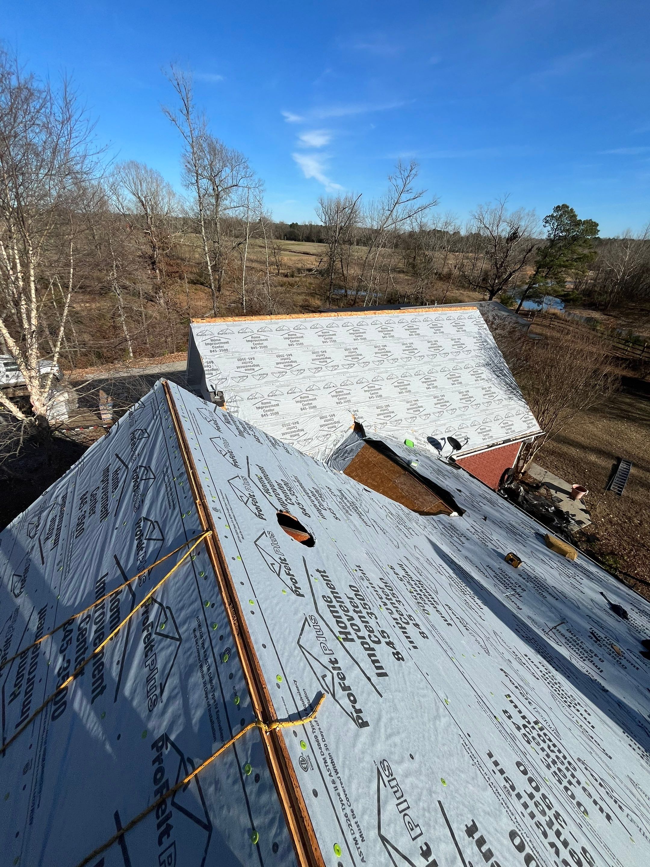 Residential Roofing Repair using CertainTeed XT25: Moire Black by Hostetler Roofing