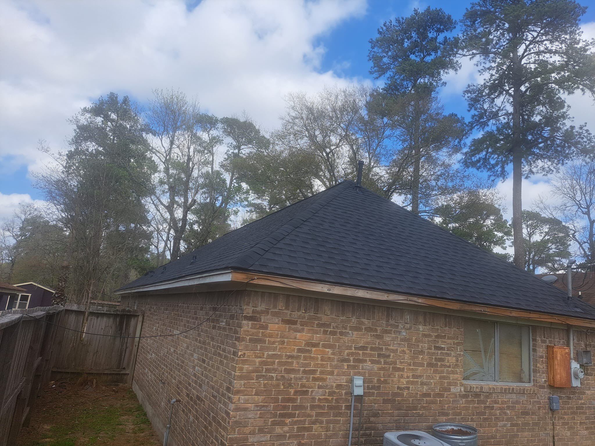 Moss-Covered Roof Made New — Conroe, TX by PL Roofing & SB Roofing, LLC.