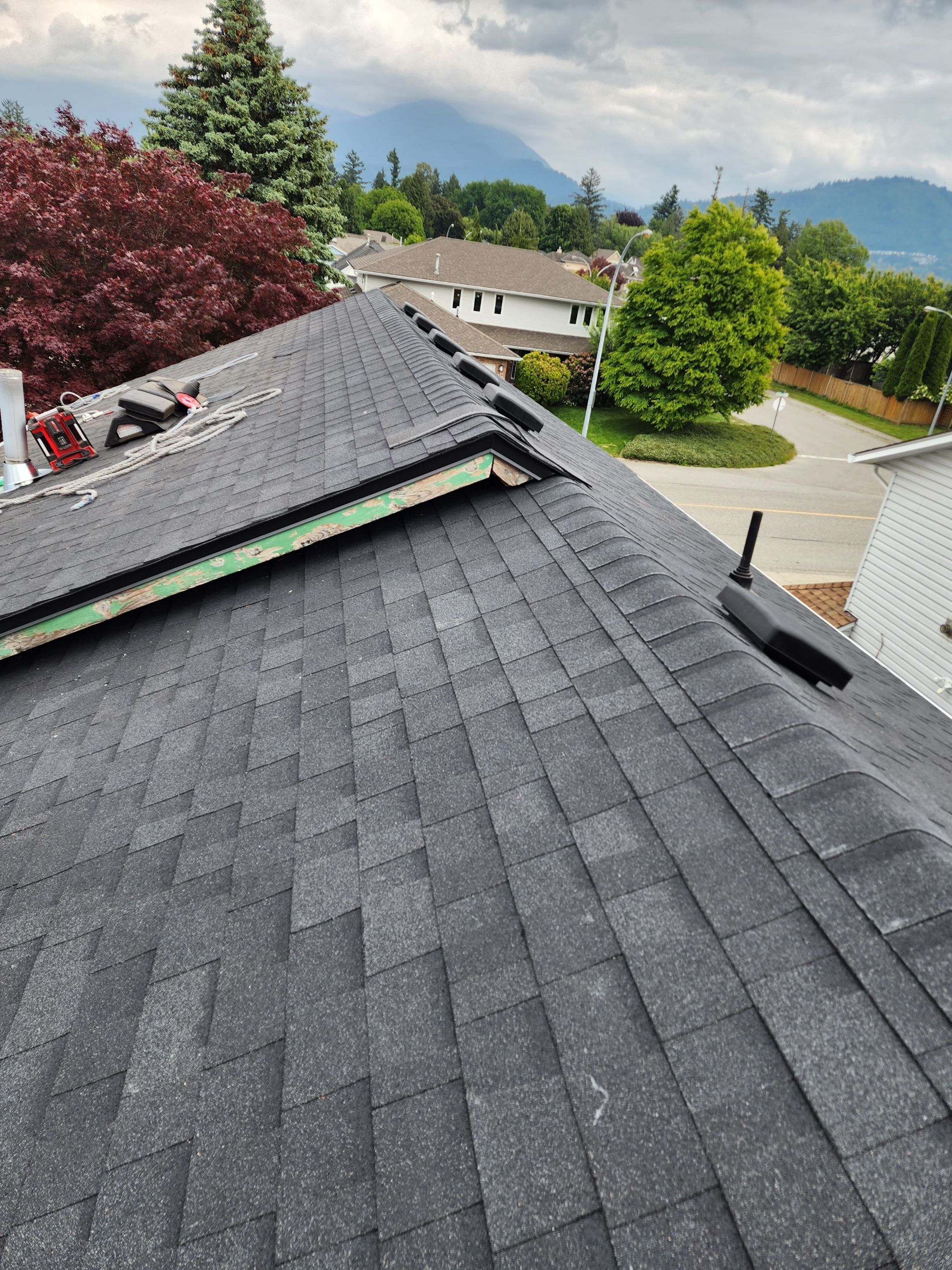 Residential Cedar ReRoofing Installation using OC Oakridge shingles by Top Notch Roofing Inc