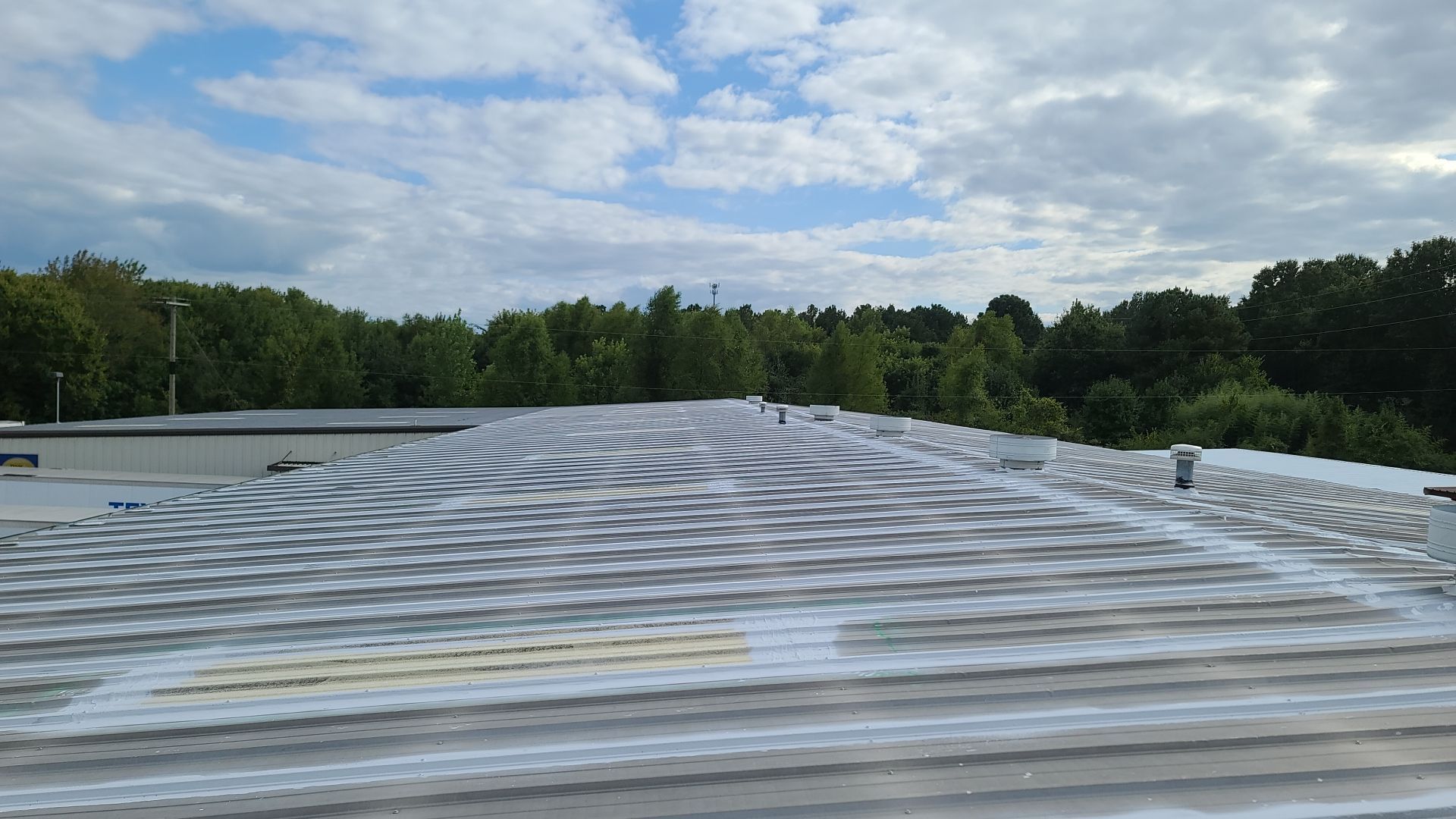 Commercial Metal Restoration System using Aldocoat Coatings by Hostetler Roofing