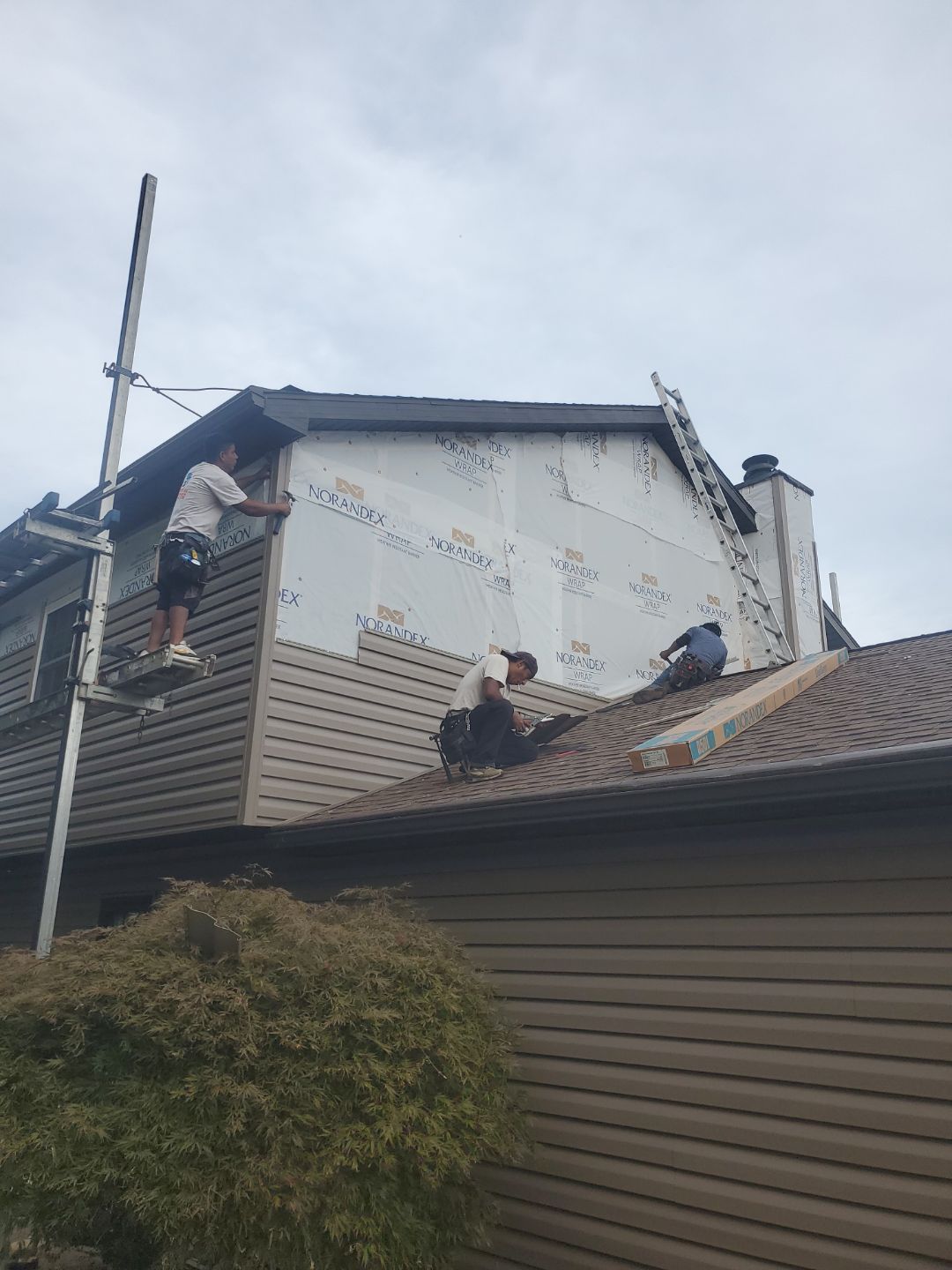Siding Installation using Vinyl Siding by Rainstoppers Roofing