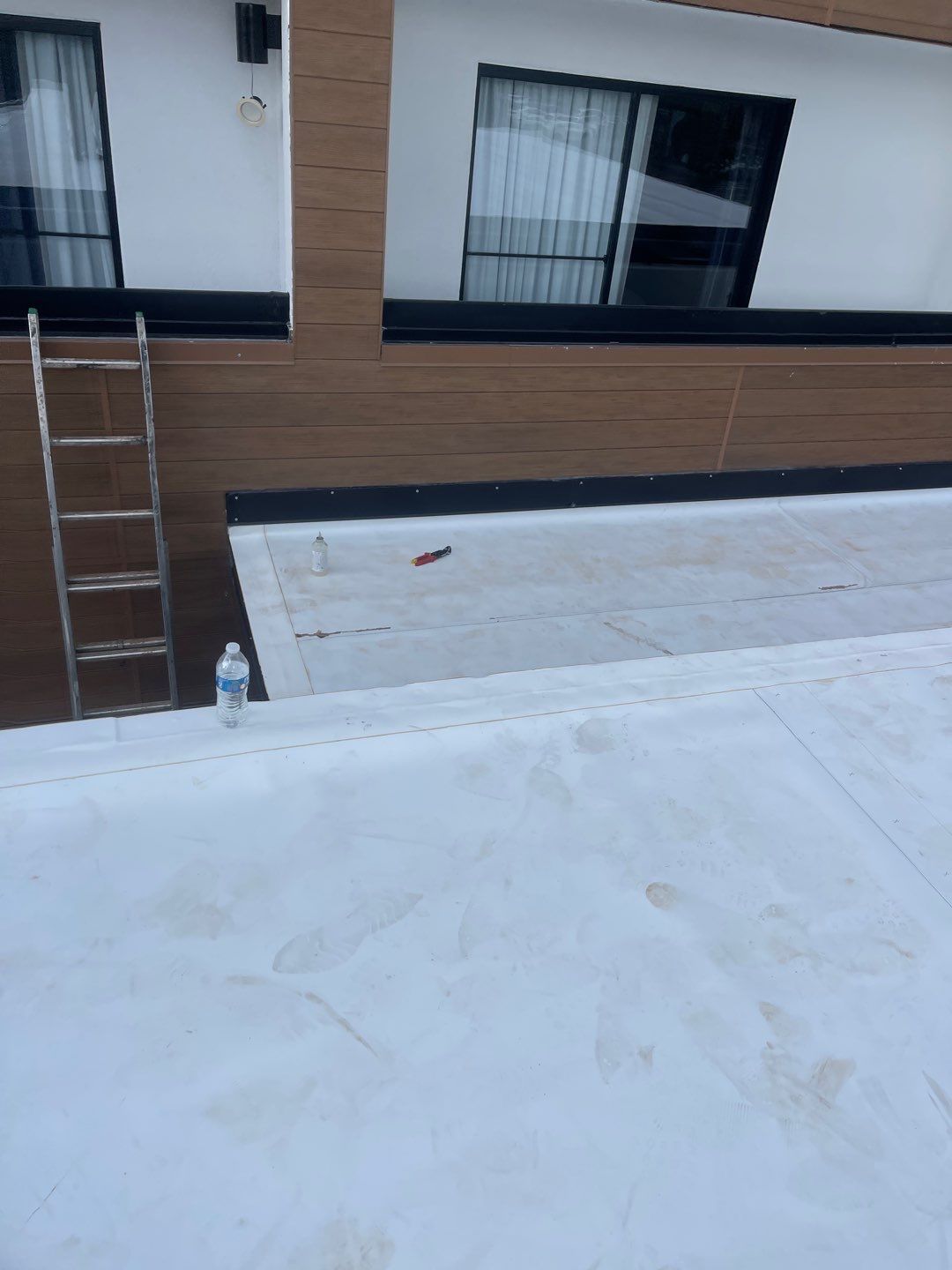 Commercial Roofing Installation using Roof Replacement by American Roofing & Construction LLC