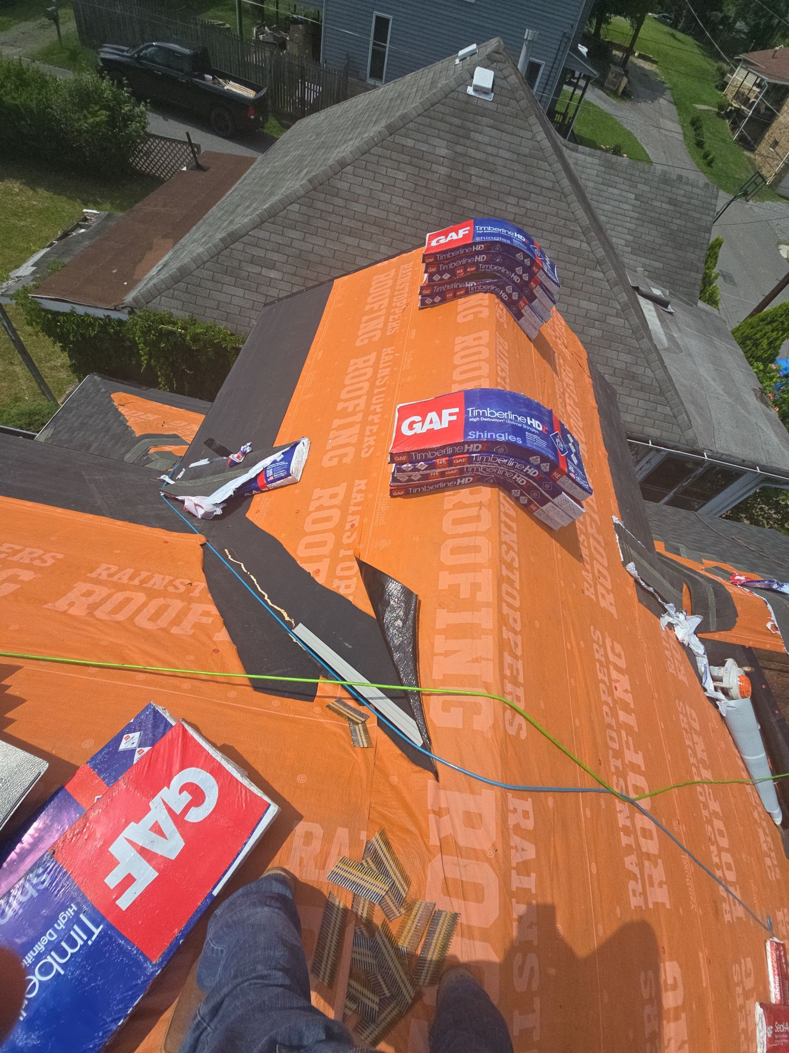 Residential Roofing Installation using GAF Timberline HDZ Charcoal by Rainstoppers Roofing