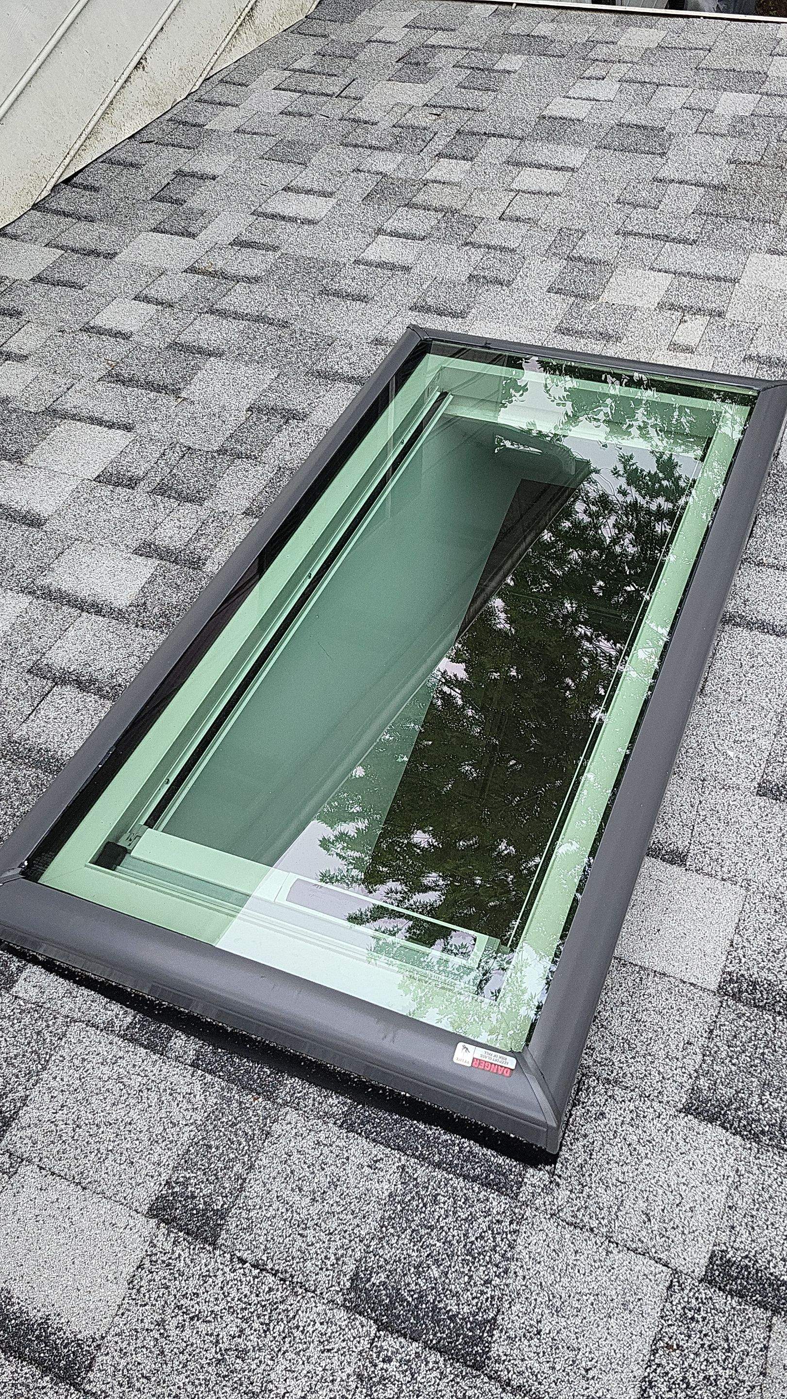 Roof Replacement with Skylight Installation in Frederick, MD by ARCH Exteriors 