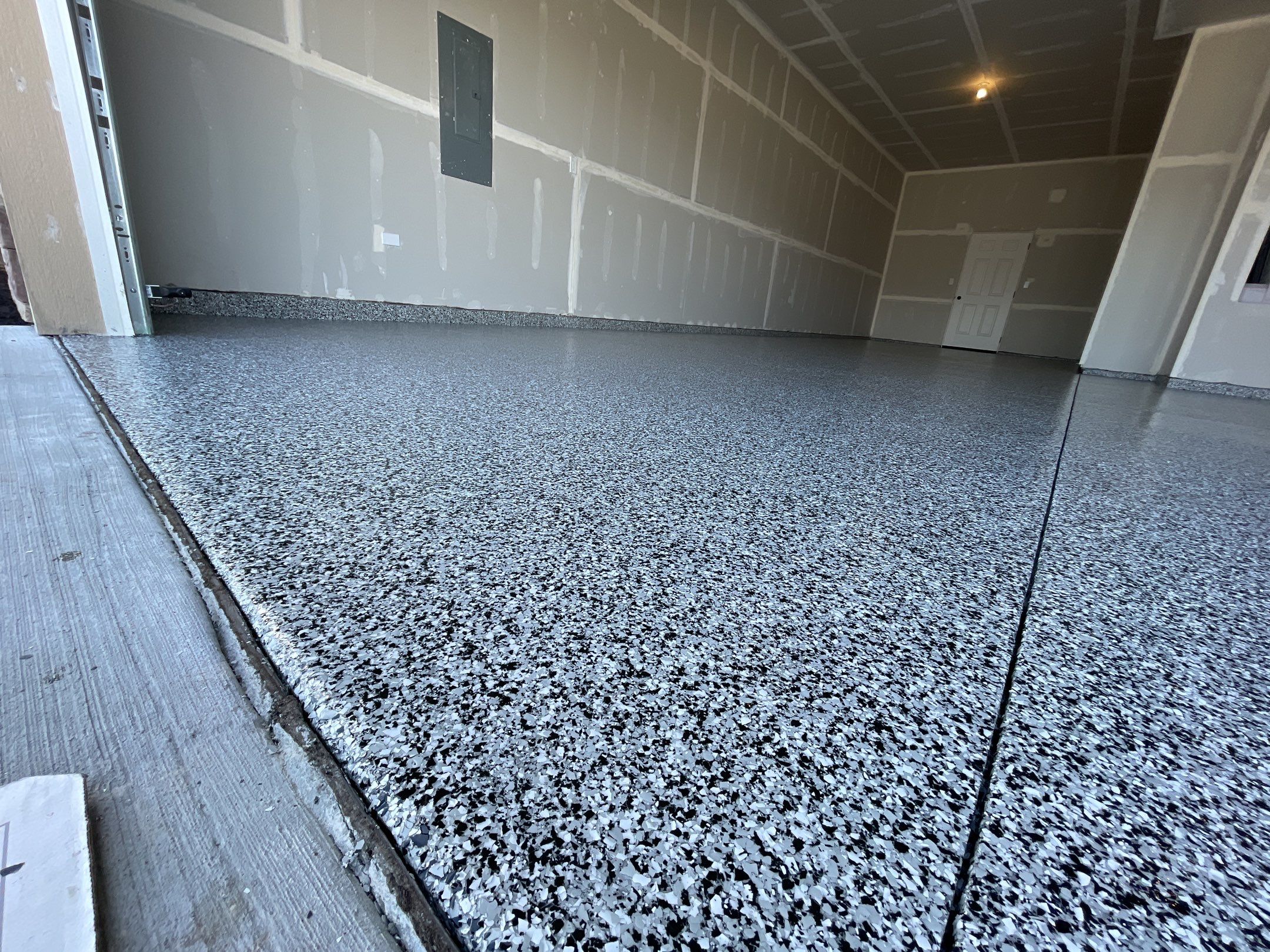 Garage Transformation using Domino by Croc Coatings, LLC