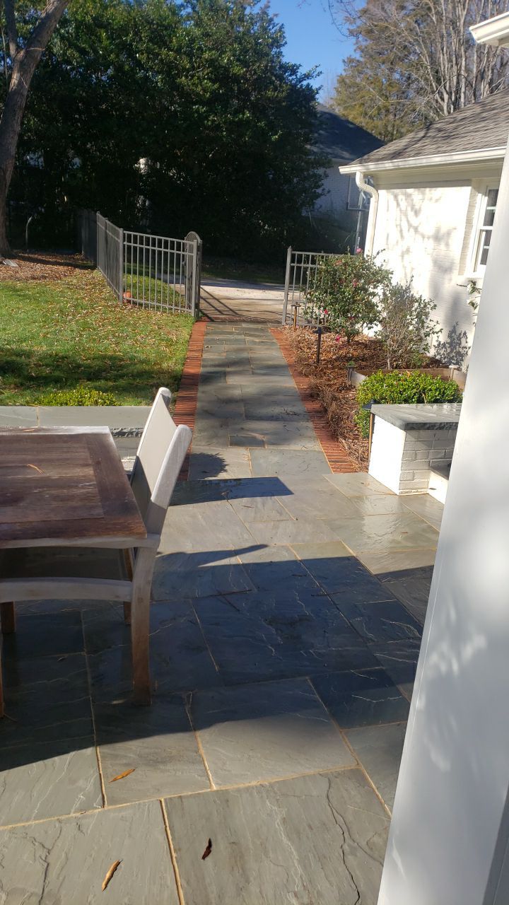 Sara Gutter cleanout using water by G&H Home Tech Pros LLC