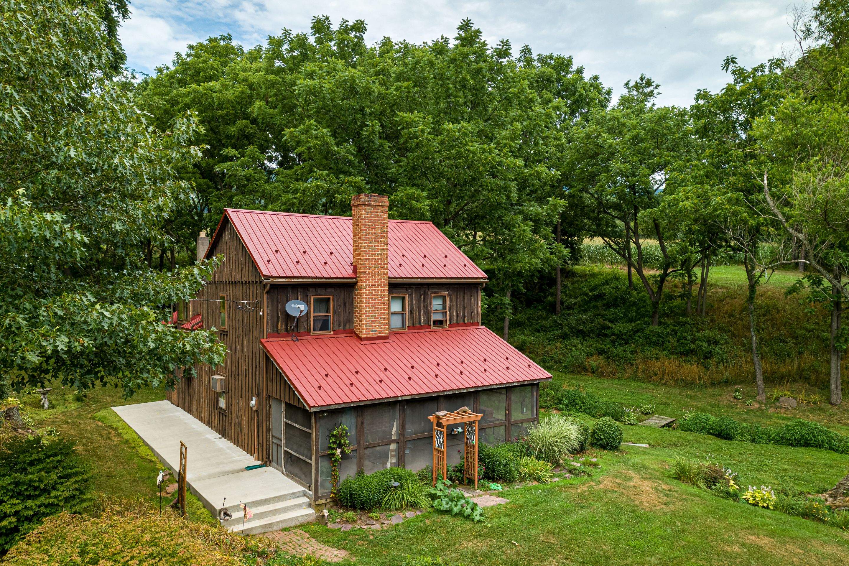 Metal Roof-colonial red by Esh Builders