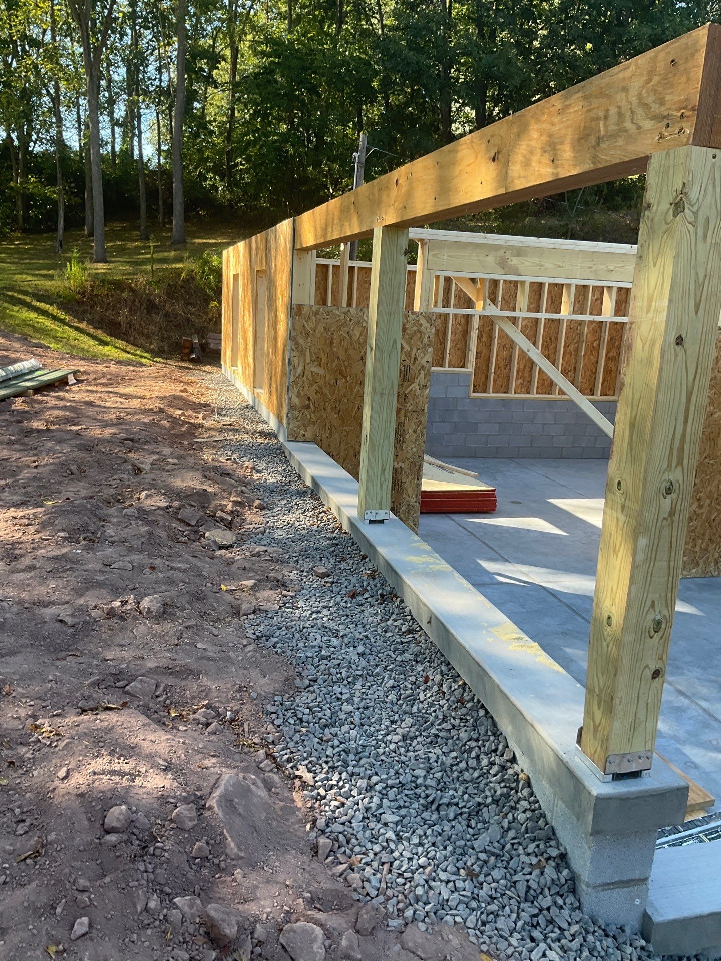 Detached Garage Construction with Vinyl Siding and Metal Roof by Esh Builders