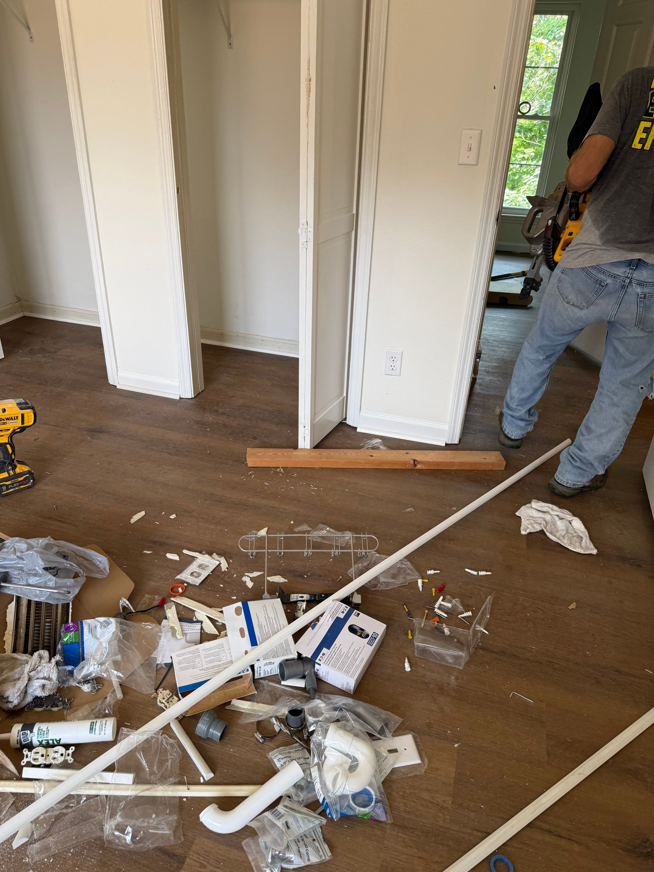 Complete Home Remodel Featuring Custom Kitchen and Wood-Look Plank Flooring by MAJO