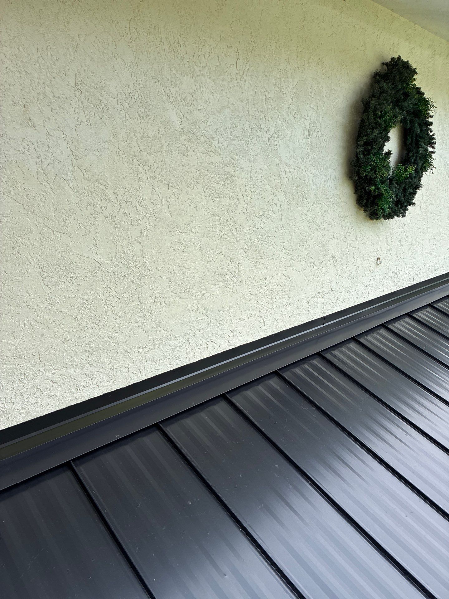 24ga 1" Nail-Strip Matte Black by Total Roofing System The Metal Roof Experts