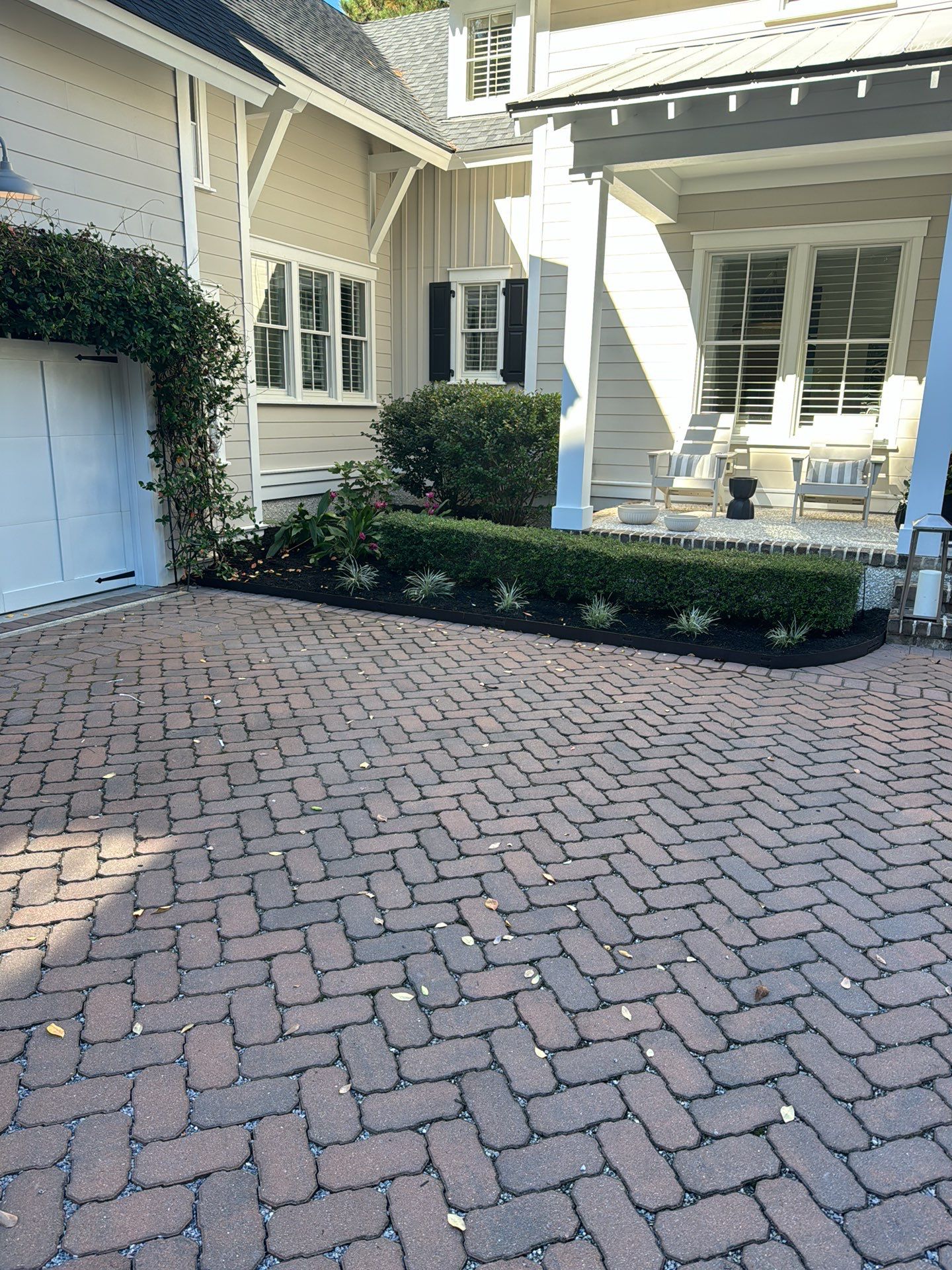 Herringbone Brick Paver Driveway and Custom Landscape Installation in Bluffton by Lowcountry Scapes, LLC