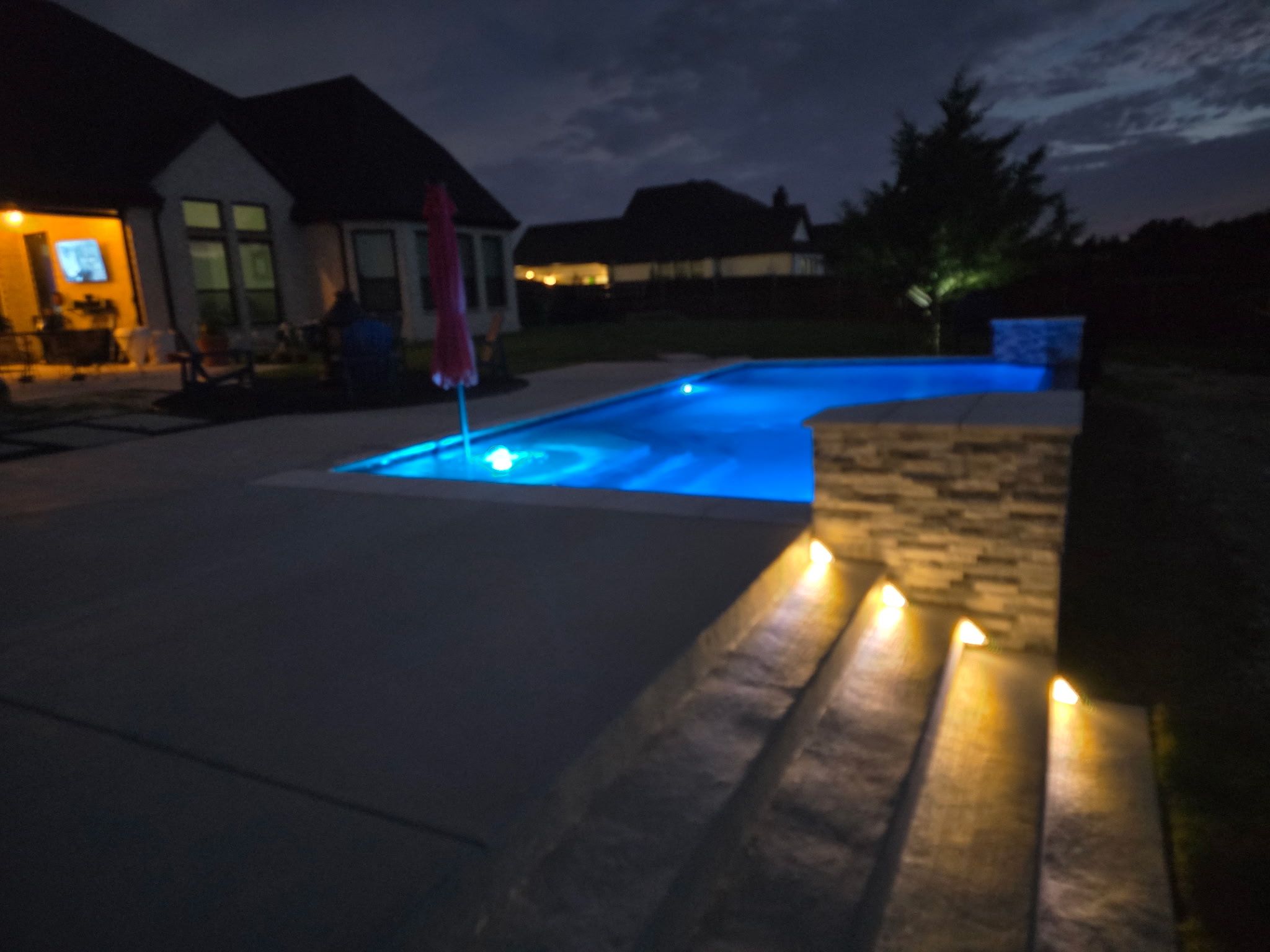 Modern Rectangular Pool with Sheer Waterfall by Pinnacle Pools and Spas - DFW
