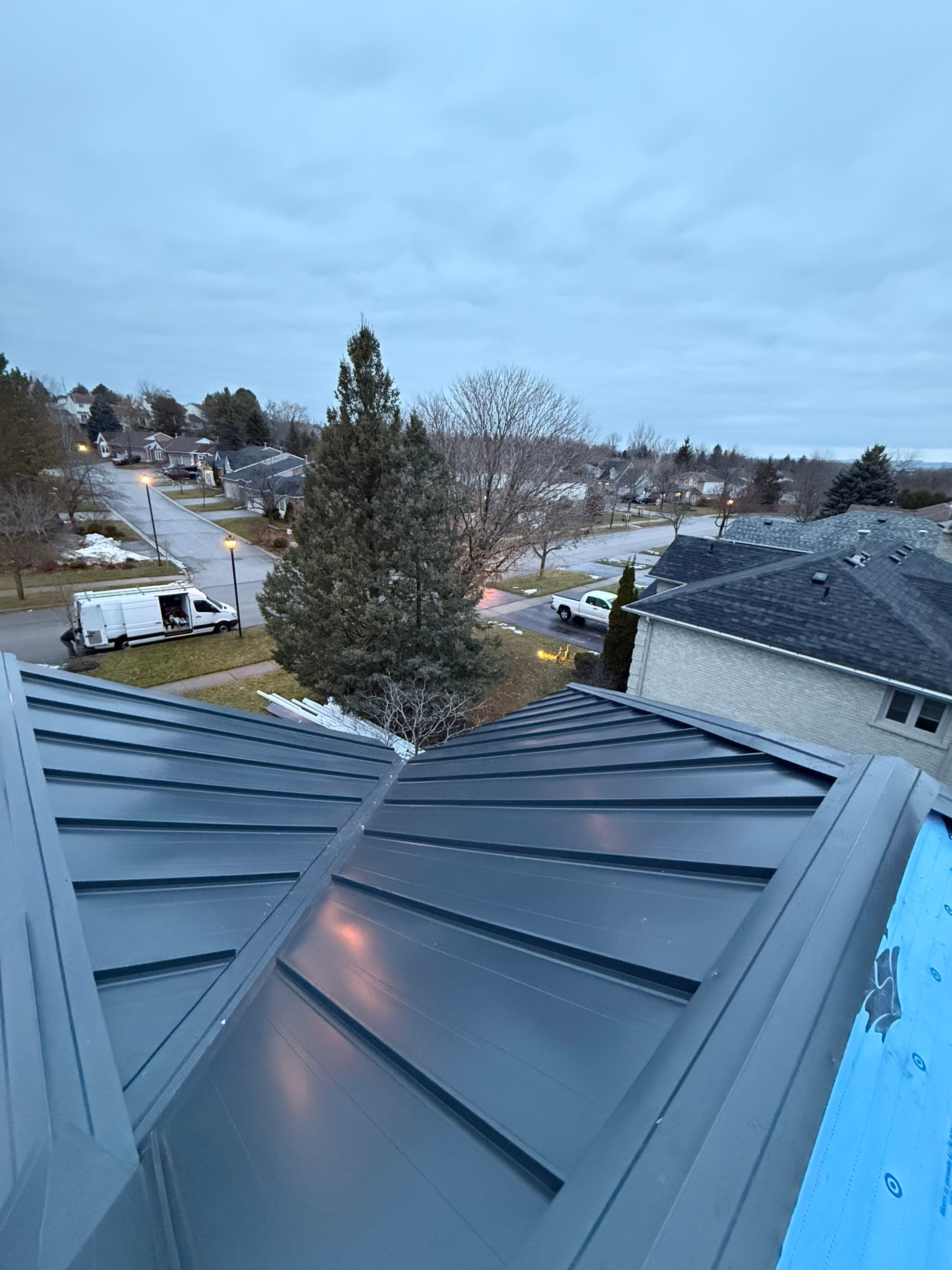 Roof Replacement using 16" Standing Seam Panels by Jay Carter Roofing & Sheet Metal