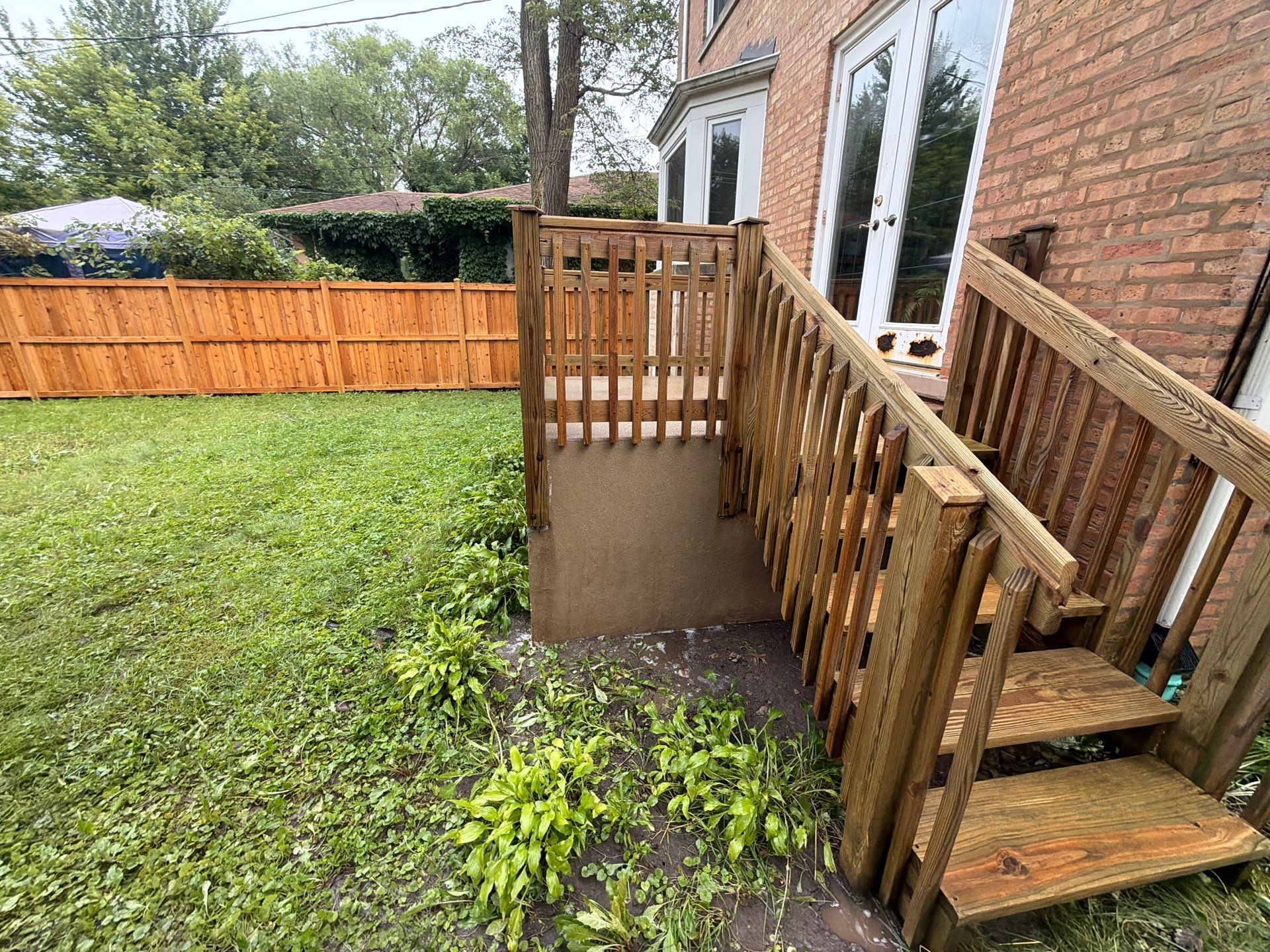 Wood fence cleaning and sealing by Northern Power Washing LLC.