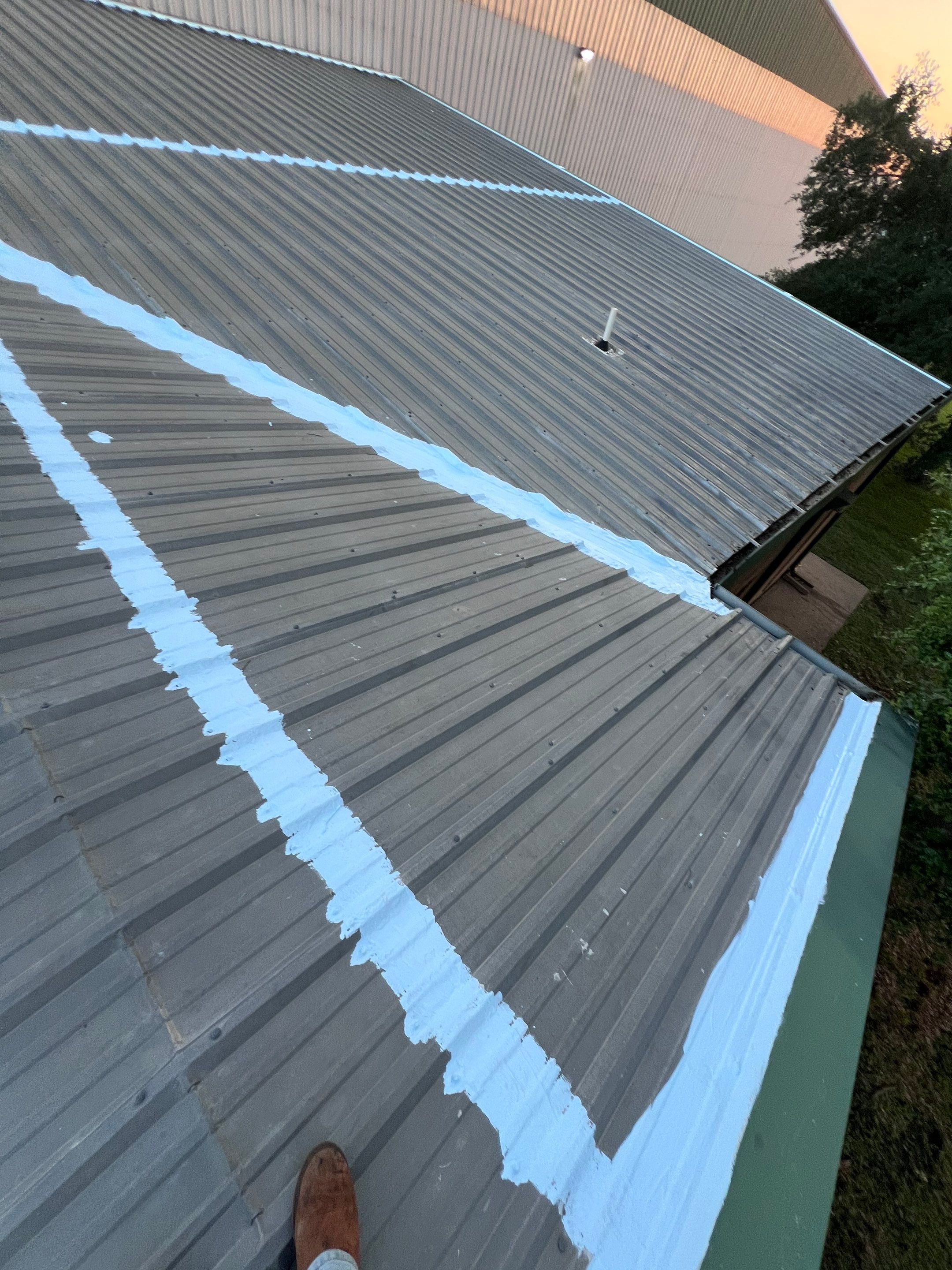 Hail Damage using Metal by Roof Repair Company
